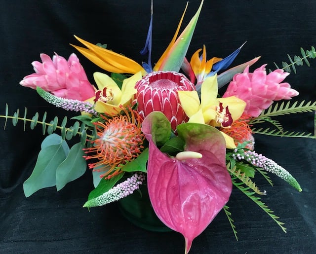 Tropical Cheer - Elegant  Cheerful tropical arrangement perfect for any occasion.