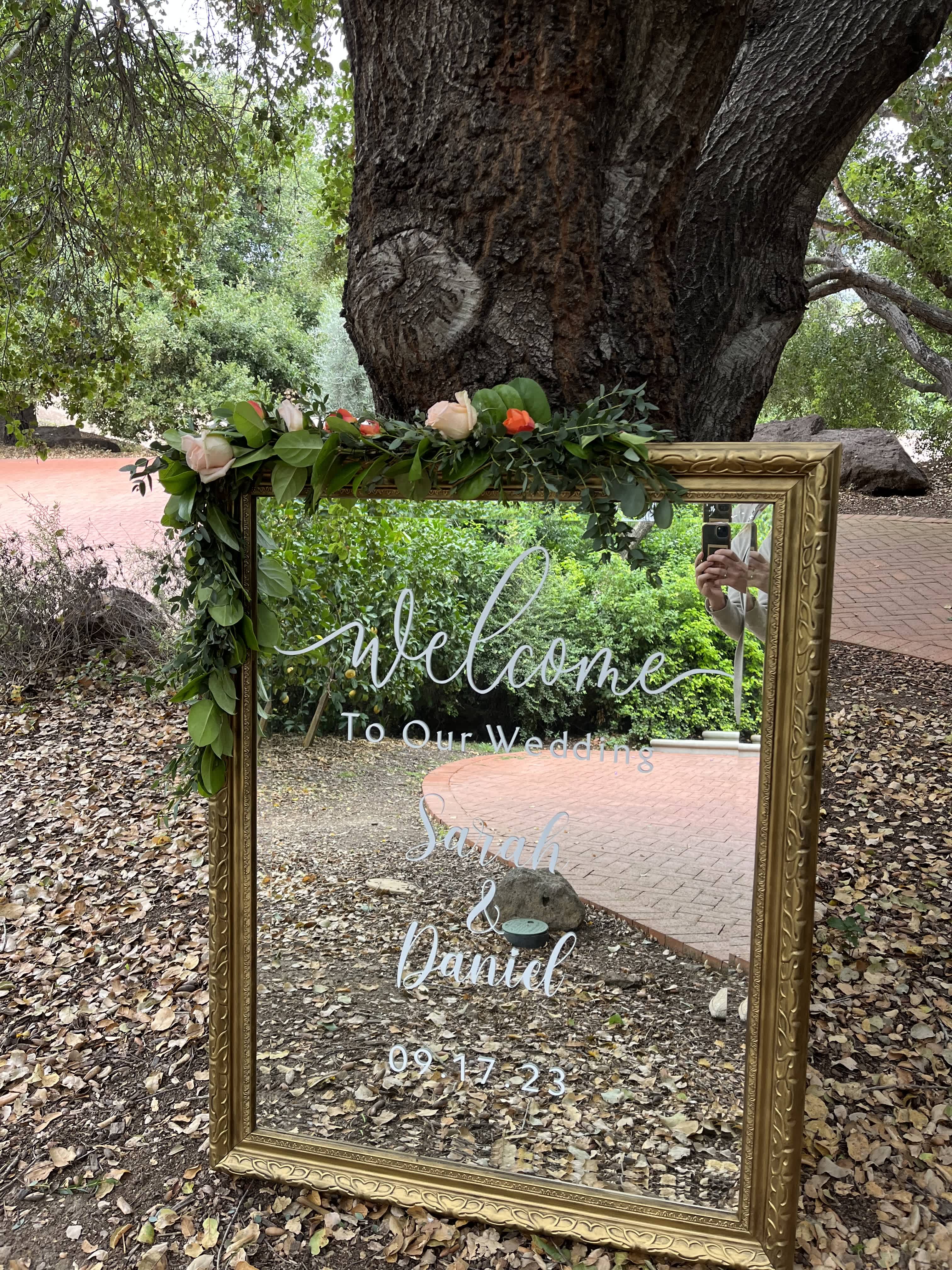 Easel, Fresh Green Garland, and Mirror Rental Package - Easel, Fresh Green Garland, and Mirror Package Rental Flowers for garland will be colors for the event.