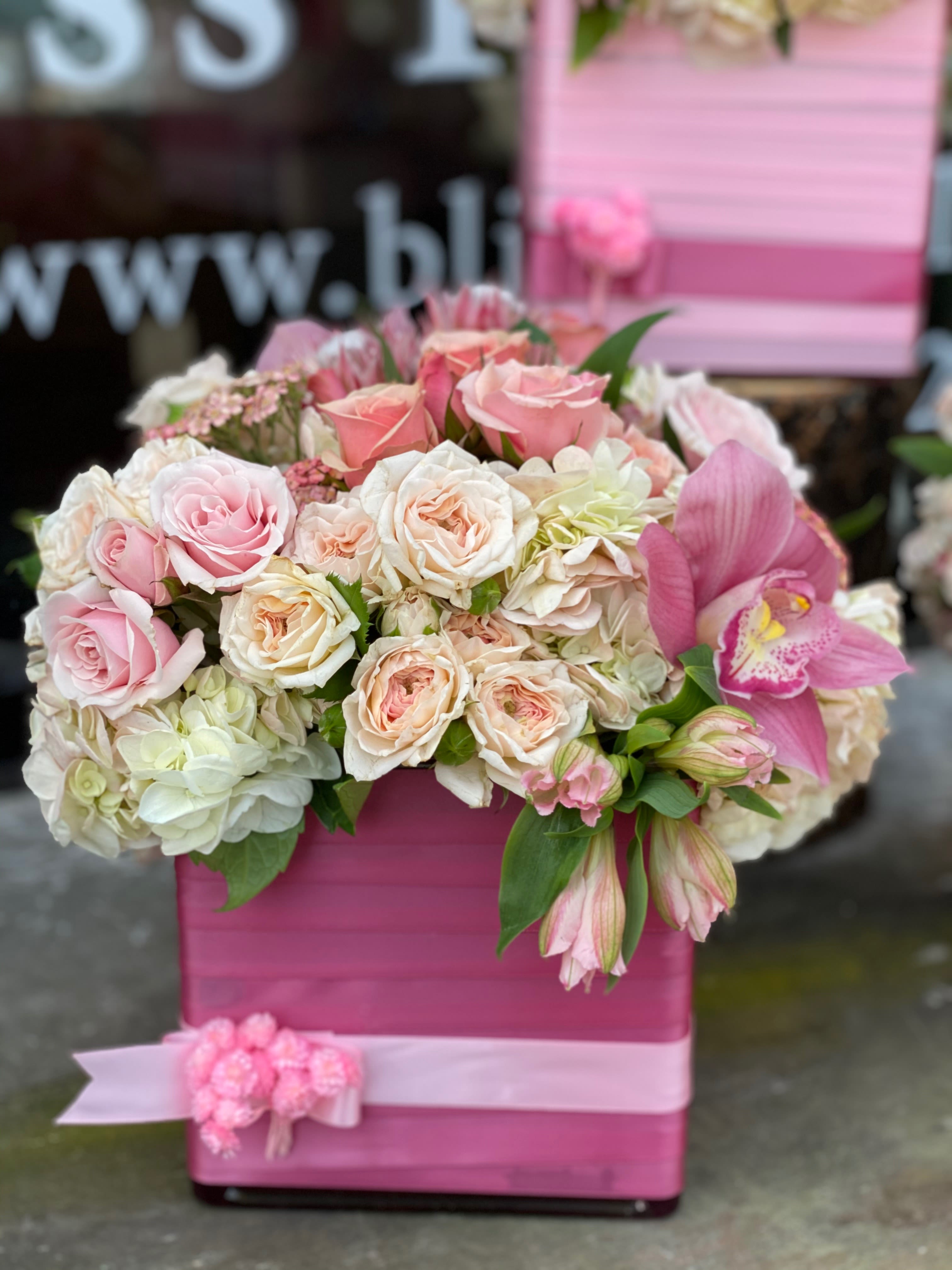 Satin Gown Satin Gown - A Bliss signature look of paved roses in a satin wrapped vase. A timeless piece that can be customized to your color preference
