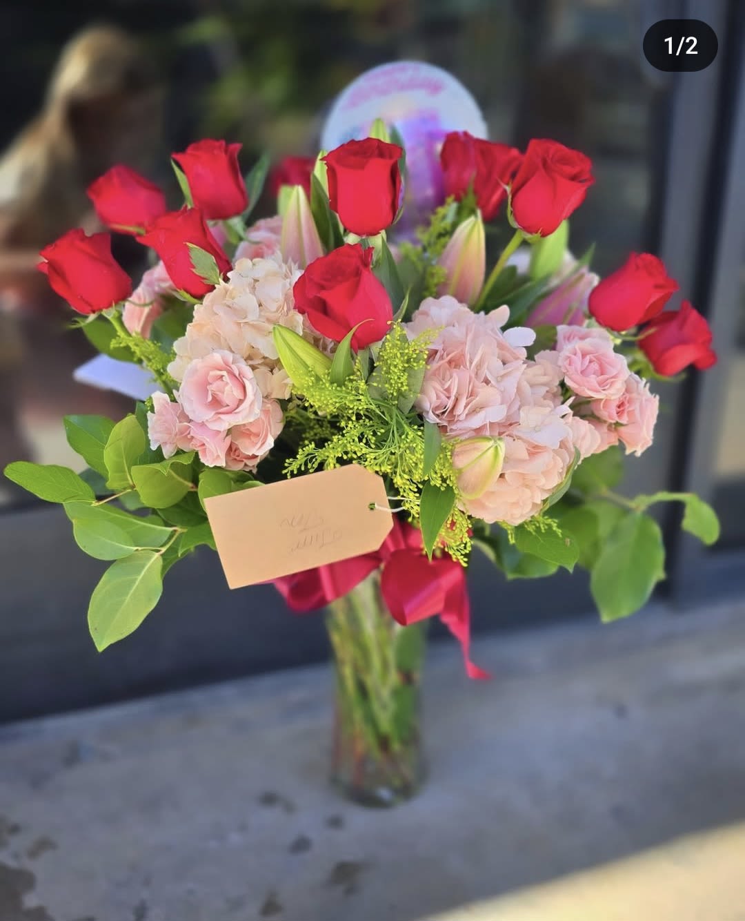 Love you to Pieces Valentine's Bouquet - A beautiful bouquet of red roses, pink hydrangea, pink stargazer lily, and and pink spray roses. Delivered straight to your loved one's doorstep.