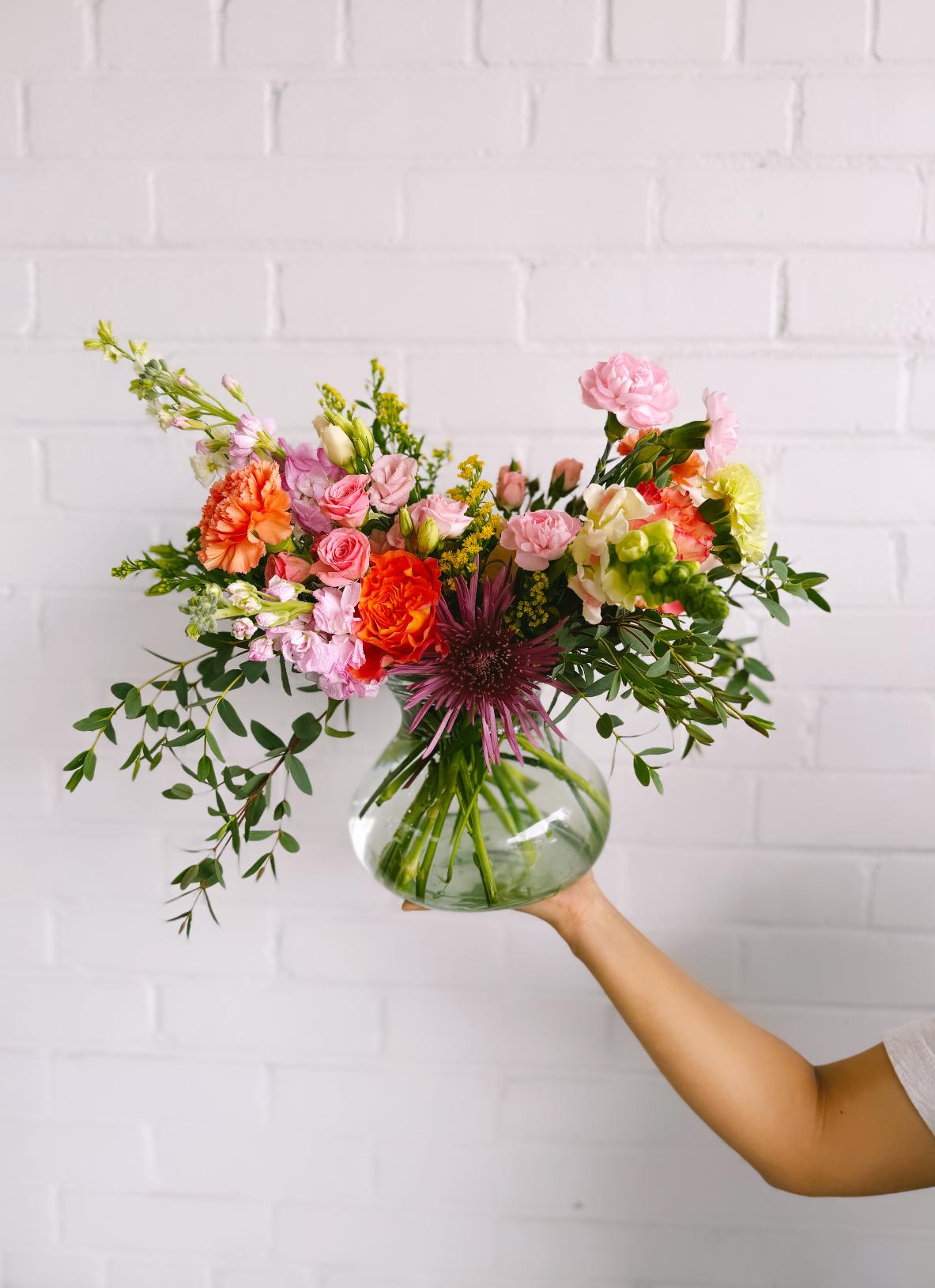 Spring Mix - This arrangement is uniquely crafted with the a variety of fresh spring florals including a mix of colorful blooms. Arrangement and vase may vary depending on product availability.