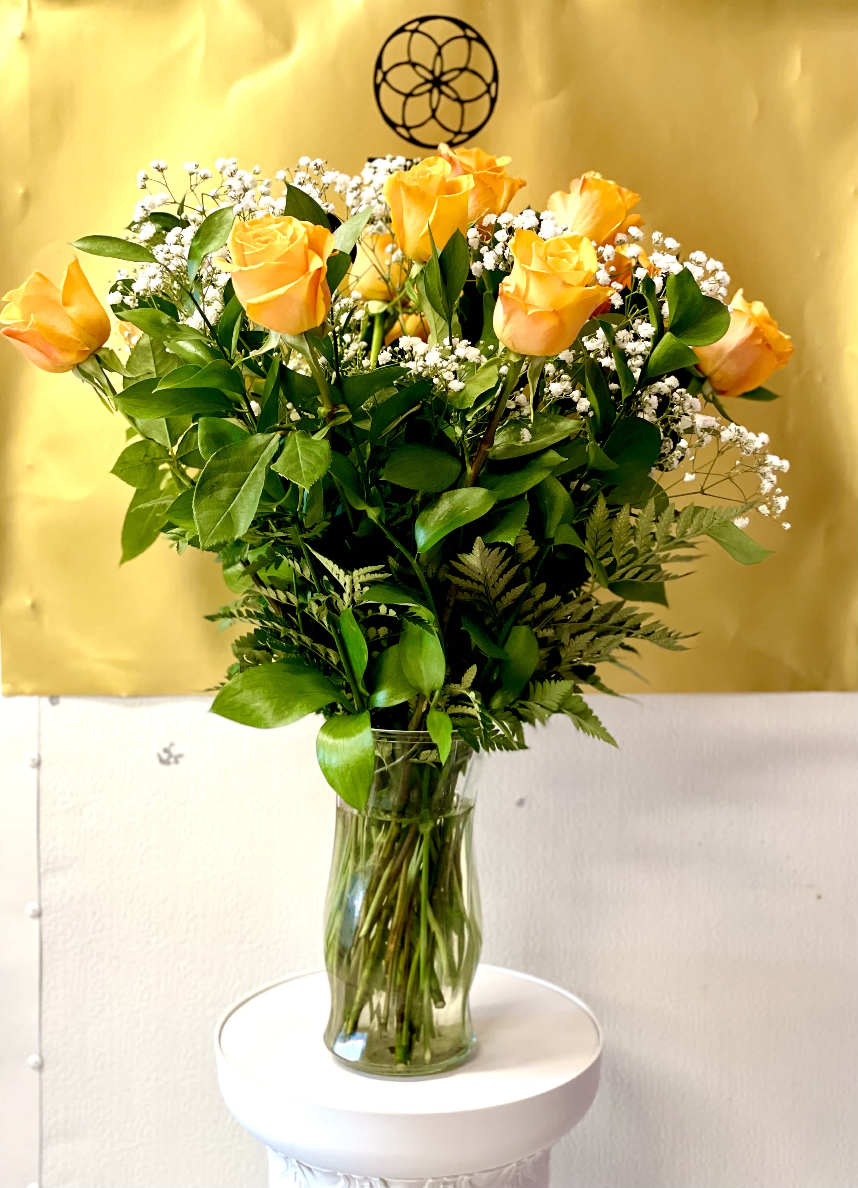 Long steam yellow roses - Yellow roses are a great option to send a non-romantic love. Send a dozen yellow roses to your friend or family member to brighten up their space and celebrate them! Yellow roses are a good gift for graduations, birthdays, or celebrating an accomplishment like a new job.  Approximate Dimensions: 18&quot;D x 25&quot;H