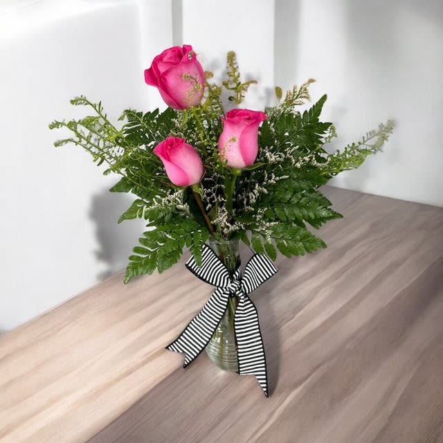 3 Roses in Budvase 3 Roses in Budvase - Send a cute and sweet rose bud vase to you love, your friend, or a relative for Valentines Day  or any occasion. Sending this arrangement  is a lovely gesture and shows that you are thinking about them. Color of roses may vary.