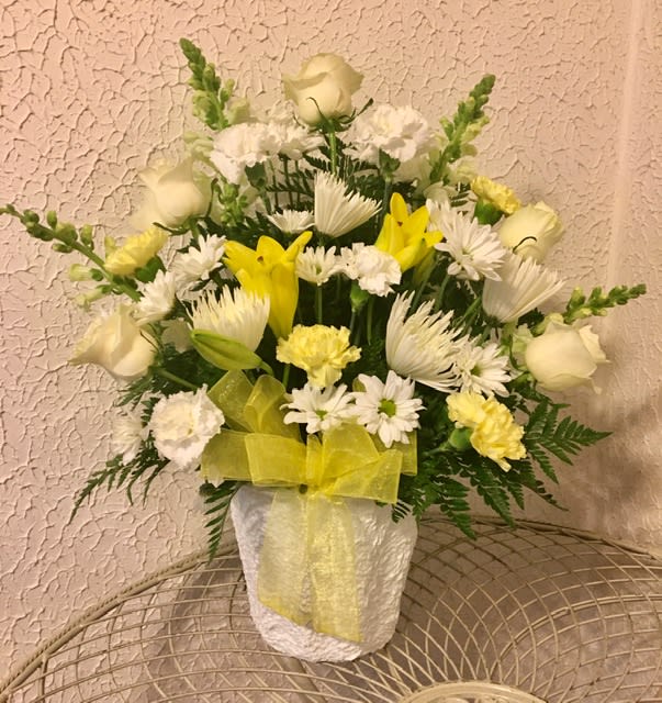 Celebration of Life Arrangement - Arrangement includes Lillies, Roses, Carnations, Snapdragons, Mums, daisies, greenery and filler
