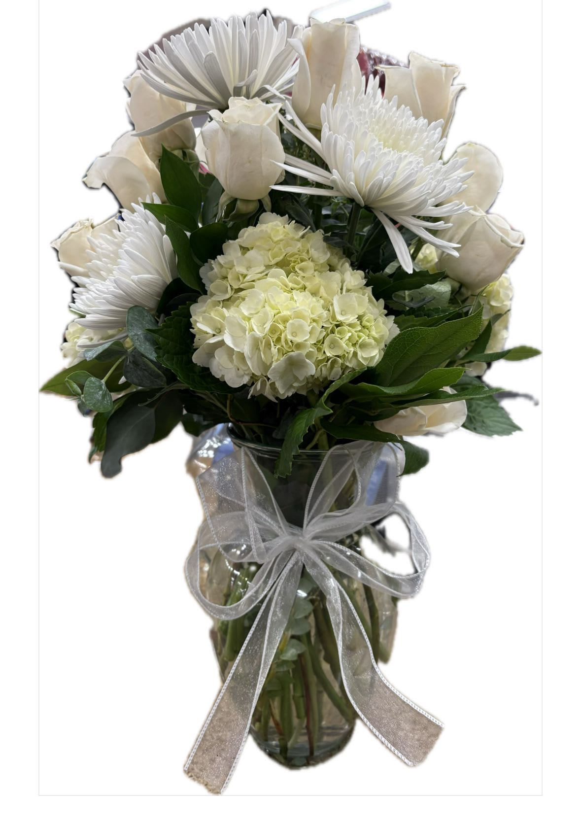 white serenity  - Tall white arrangement perfect for any occasion featuring white hydrengeas, white dozen roses, mixed greenery and white disbuds, perfect for sympathy occasions or an amazing surprise.