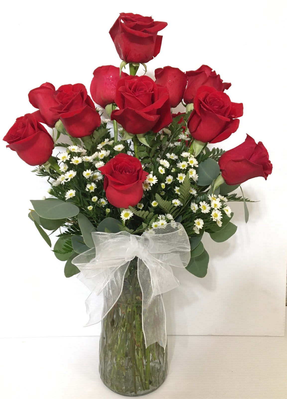 Roses Galore  - 1 dozen Beautiful Roses, filler and assorted greenery in a vase 