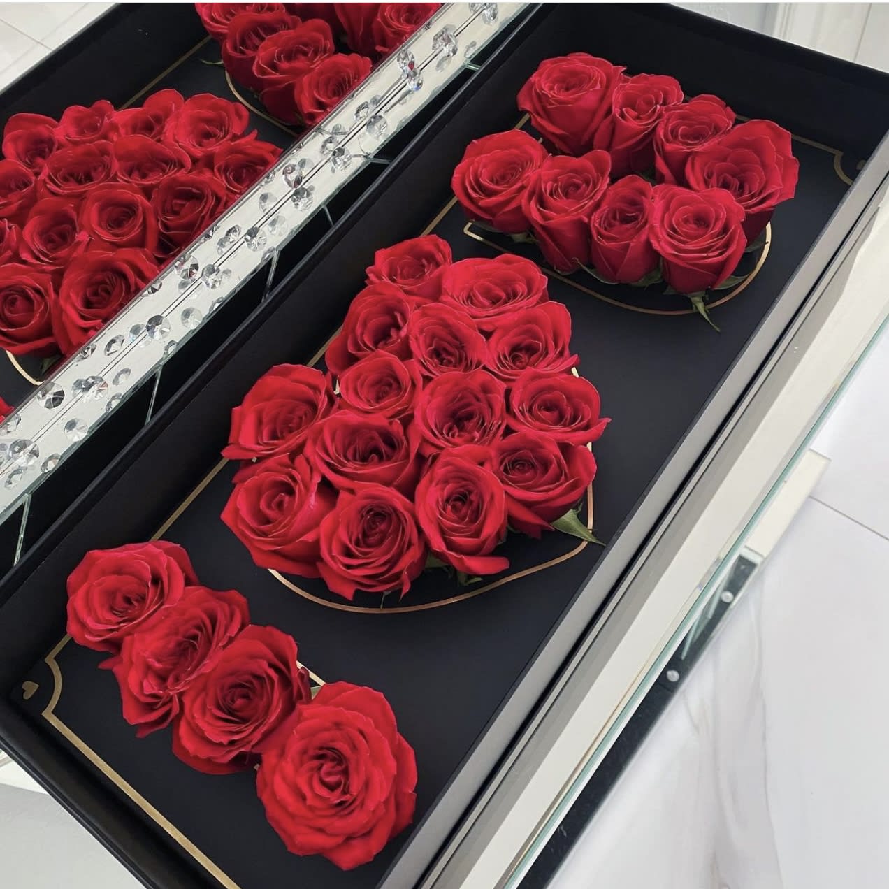 Eternal Love Eternal Love - Proclaim your eternal love with this breathtaking modern rose box. - This Bouquet features 24 plus red roses arranged in a black modern box. Comes with a cover and a big bow, to surprise your eternal love.