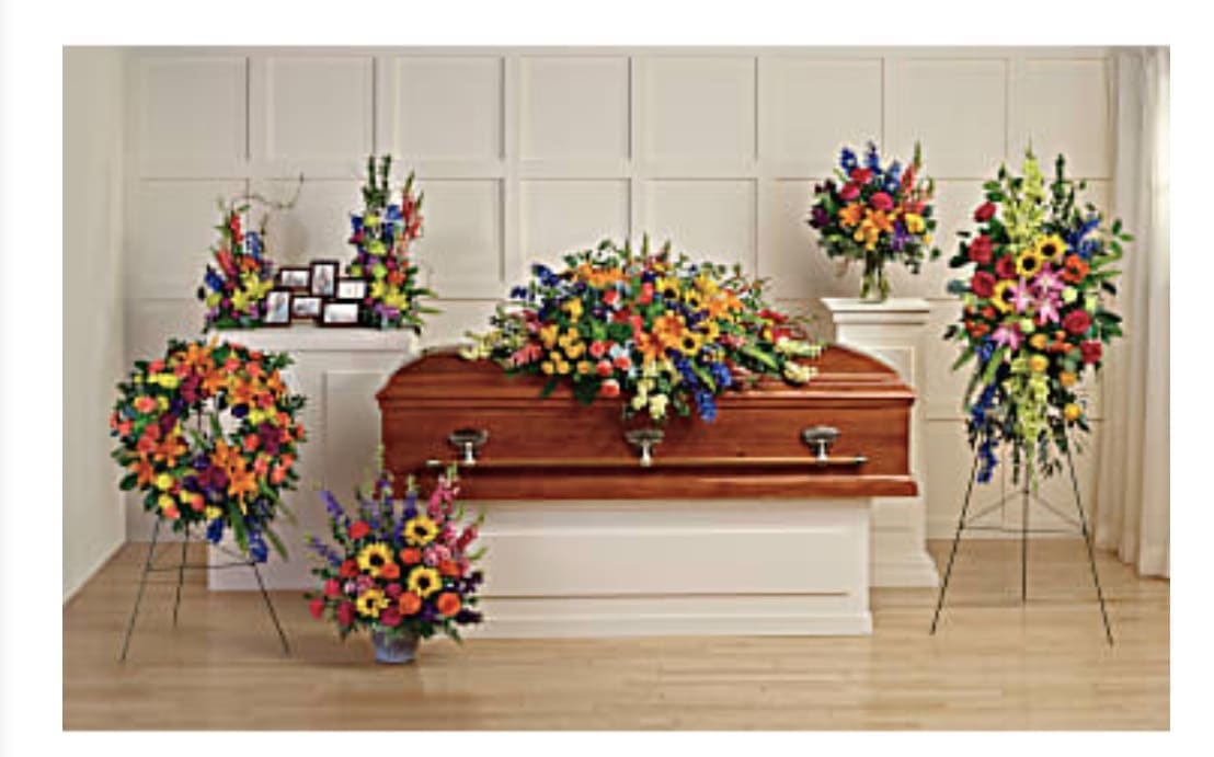 COLORFUL REFLECTIONS COLLECTION COLORFUL REFLECTIONS COLLECTION - Celebrate the beautiful colors of your beloved memories with this rainbow-inspired collection, featuring six hand-made sympathy pieces that are both radiant and reverent. Colorful Reflections Collection includes the following six sympathy set pieces: Colorful Reflections Casket Spray, Love Lives On Spray, Colorful Serenity Wreath, Hues Of Hope Bouquet DX, Loving Farewell Photo Tribute Bouquet DX, Colors Of The Rainbow Bouquet DX