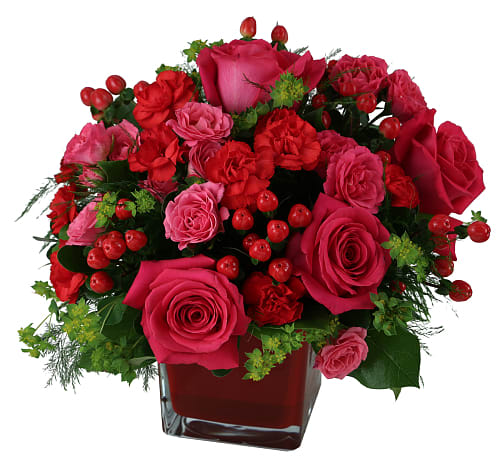 Hearts on Fire Hearts on Fire - Declare your love with this radiant bouquet of hot pink roses and spray roses, red carnations, berries and more! Designed in a red glass cube vase!