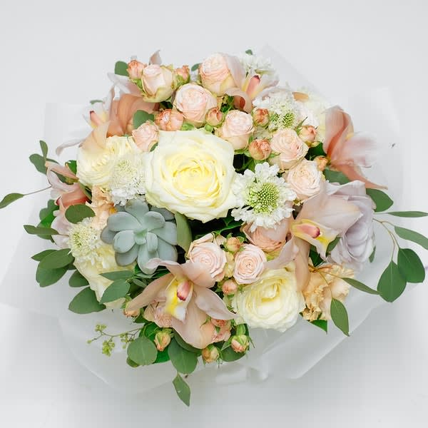 Mojave - A pastel mix of delicate pinks, eucalyptus, and a succulent, bringing a rosy glow to your object of affection. 