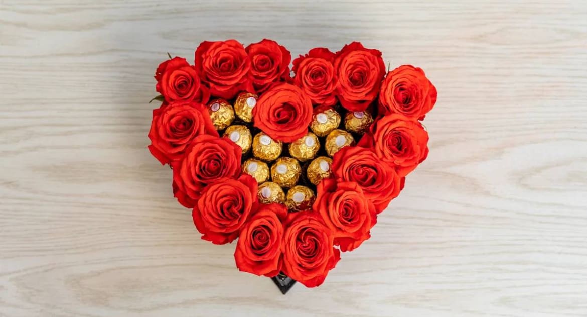 Heart of Dulce Heart of Dulce - Heart Shape Red Roses with a Ferrero Rocher center, hand-arranged and delivered.