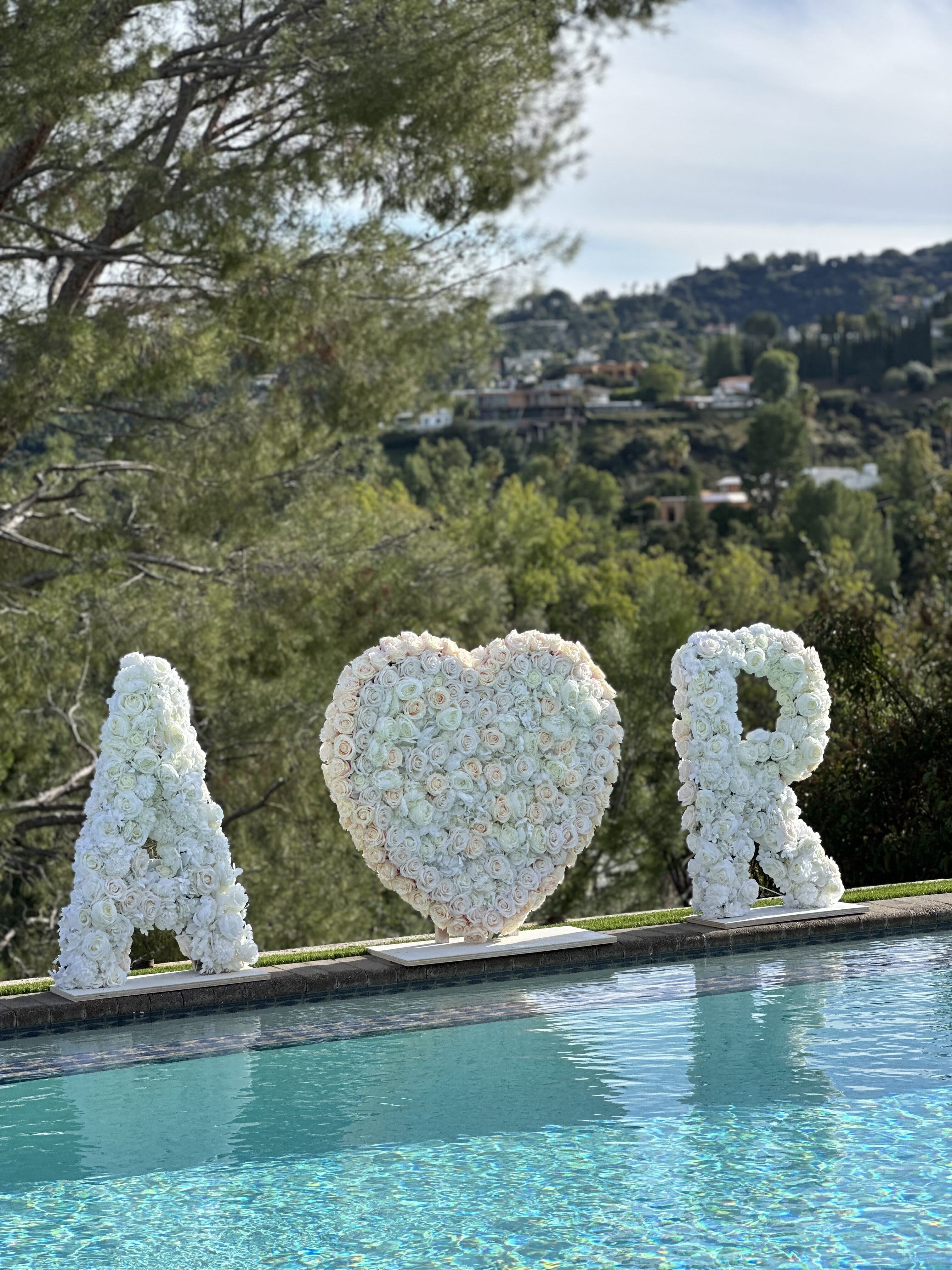 Initial Standing Flower Arrangement - Make a grand declaration of love with this spectacular personalized giant initials arrangement that captures the essence of romance and devotion. It is a statement piece that symbolizes the magnitude of your love, with initials of your choice. Perfect for Valentine's Day or any special occasion, this heart is more than a gift; it's a visual testament to the boundless beauty and grandeur of love. Can be customized in any color. 