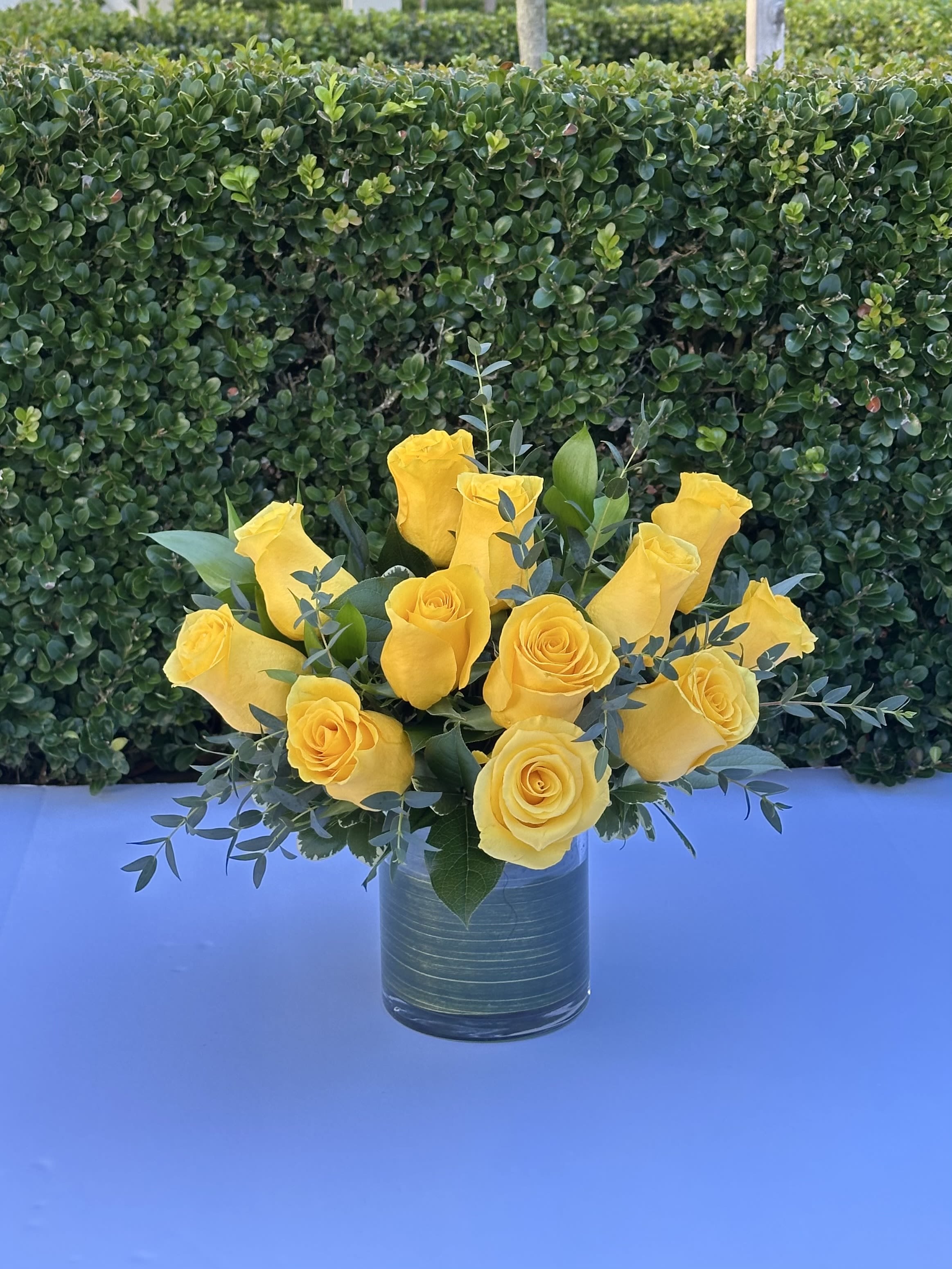 Sunny Yellow Roses - 12 yellow roses designed in a low and lush style. Also available in 18 and 24