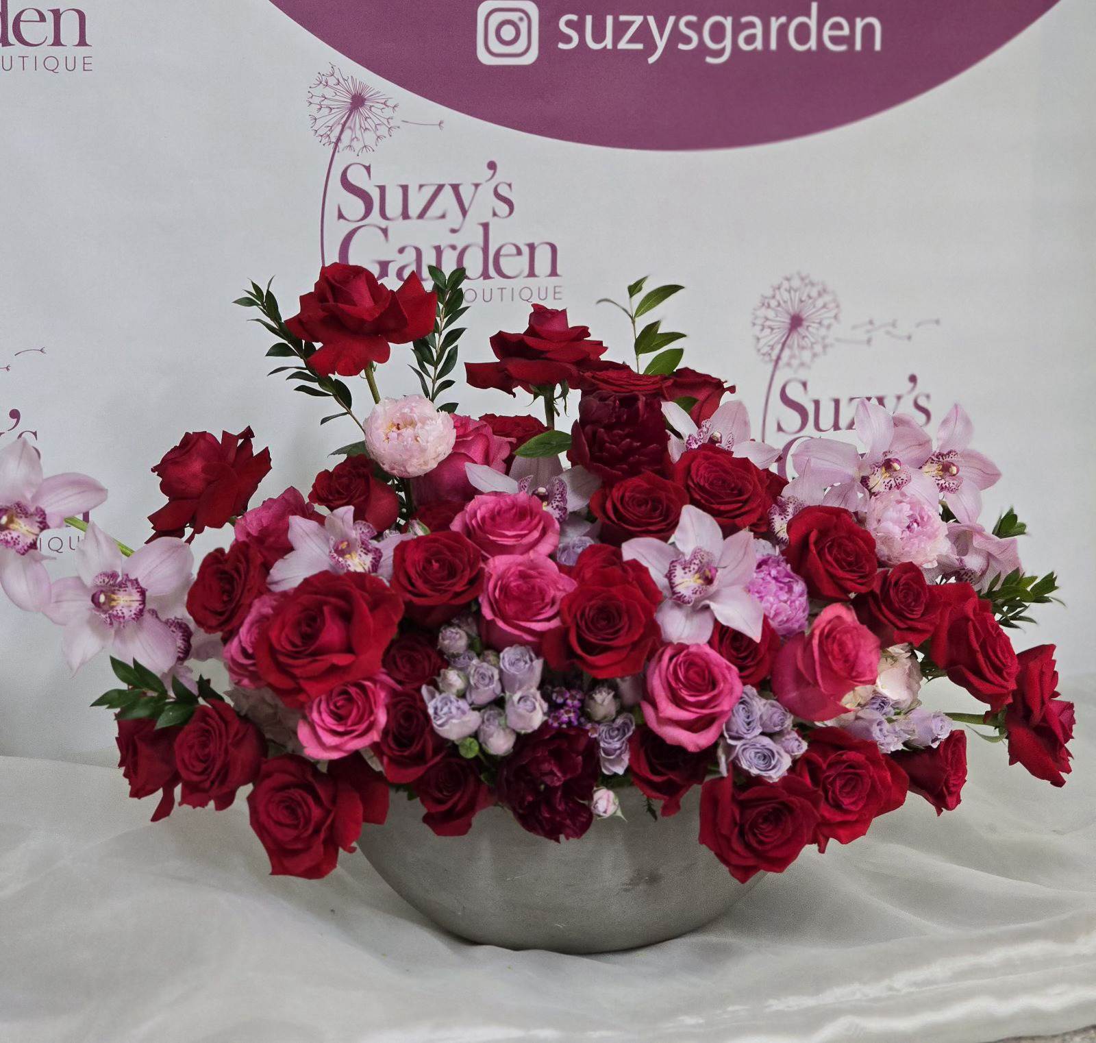 Gorgeous Ceramic Vase Arrangement  - Roses, orchids, and ceramic vase. Comes in any color of choice.