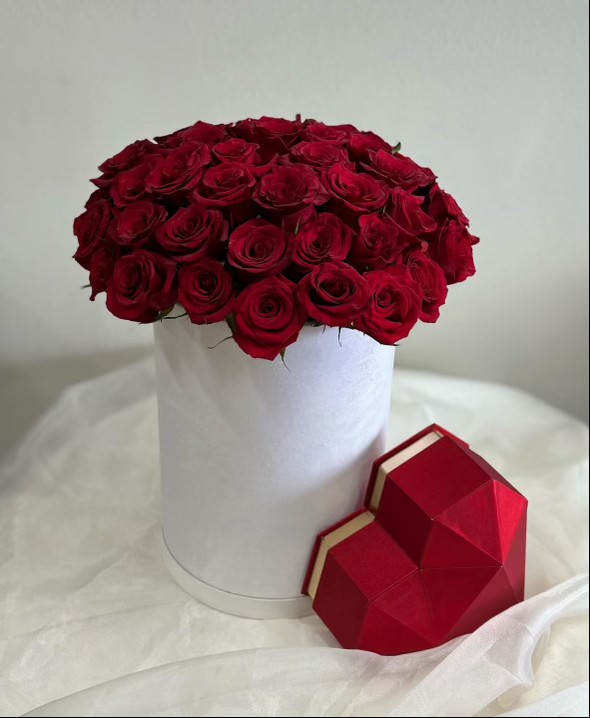 Rose Box Arrangement Rose Box Arrangement - 50 any color of choice roses all around arranged in a box of any color of choice