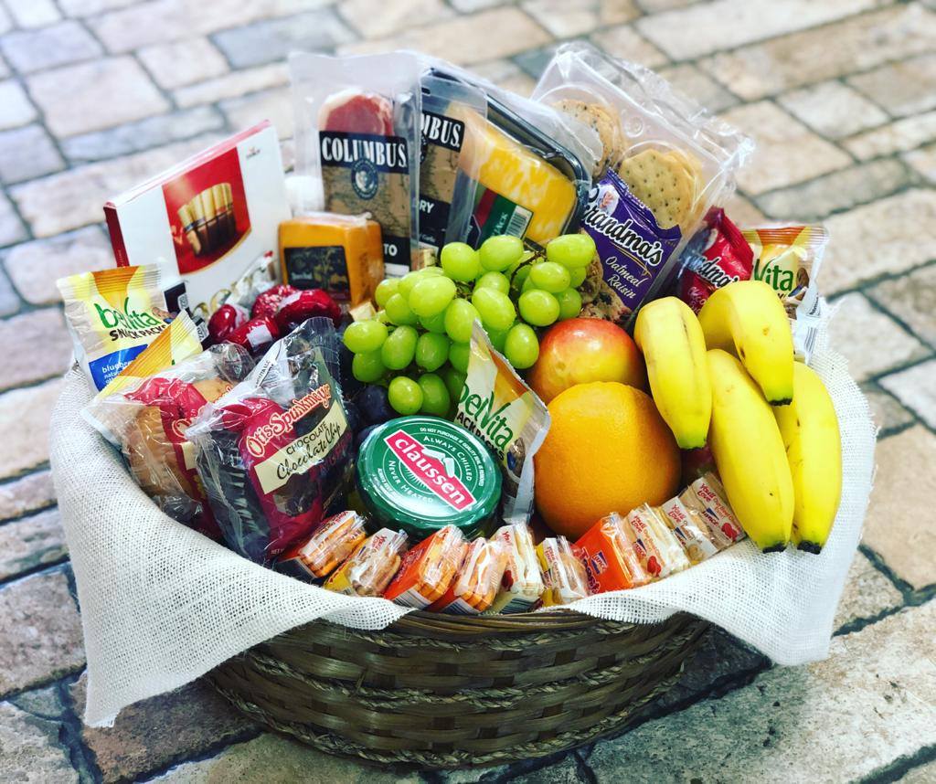 Charcuterie Basket Charcuterie Basket - Want to send something besides flowers? Our charcuterie basket is the perfect gift for anyone! Loaded with snacks including meats, cheeses, crackers, seasonal fruits, pickles, and other favorites this basket is rich with savory delights. Have a special request? Please contact us and we will be happy to accommodate the best we can.