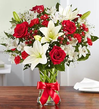 Grand Sweetheart Bouquet Grand Sweetheart Bouquet - A beautiful arrangement of winter favorites. Perfect any holiday occasion.