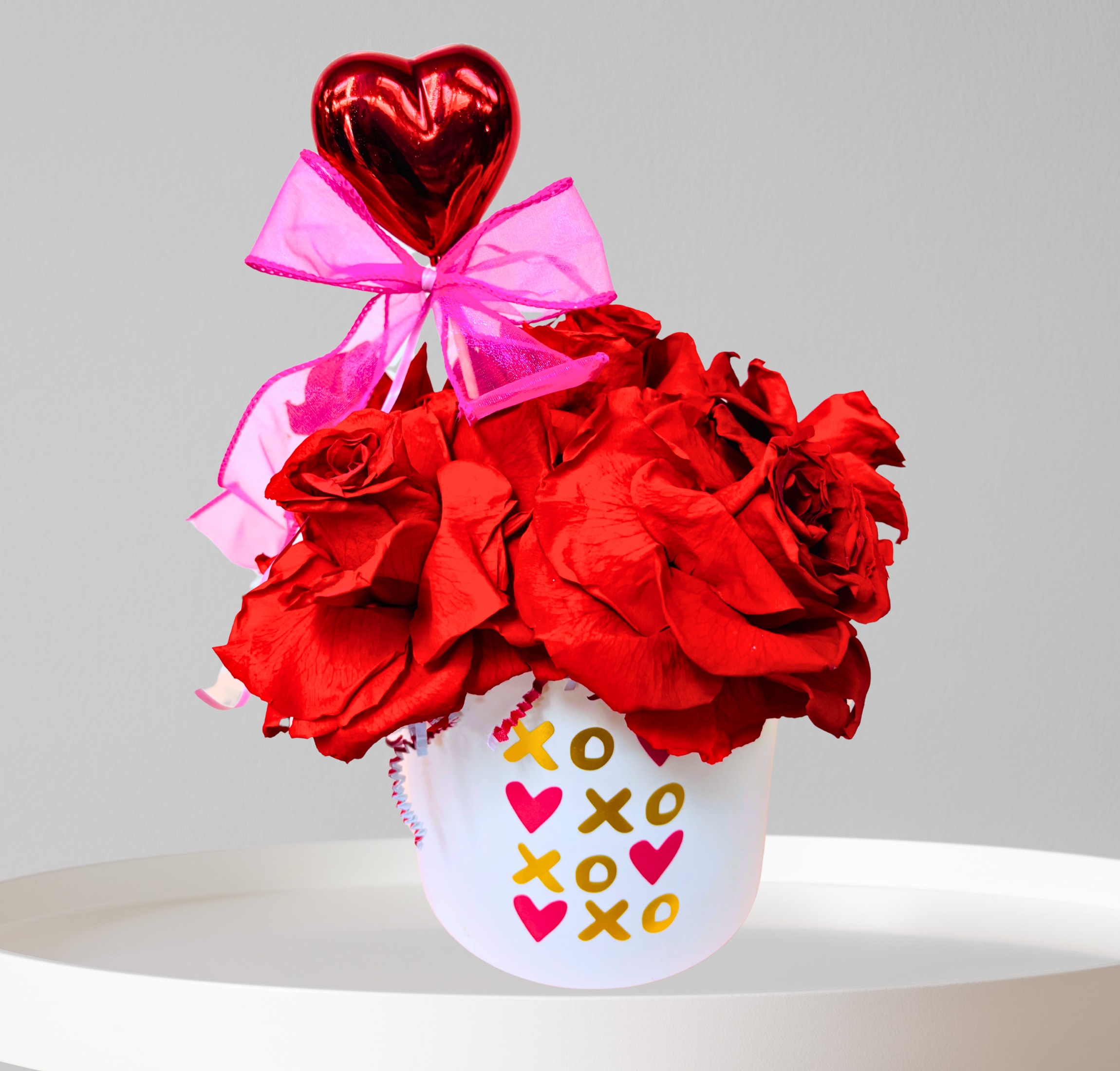 Everlasting Roses - Designed With 6 Beautiful Preserved Red Roses that will last 1 year or more, in  a gorgeous handcrafted ceramic Vessel.   The Perfect Gift That's Everlasting!