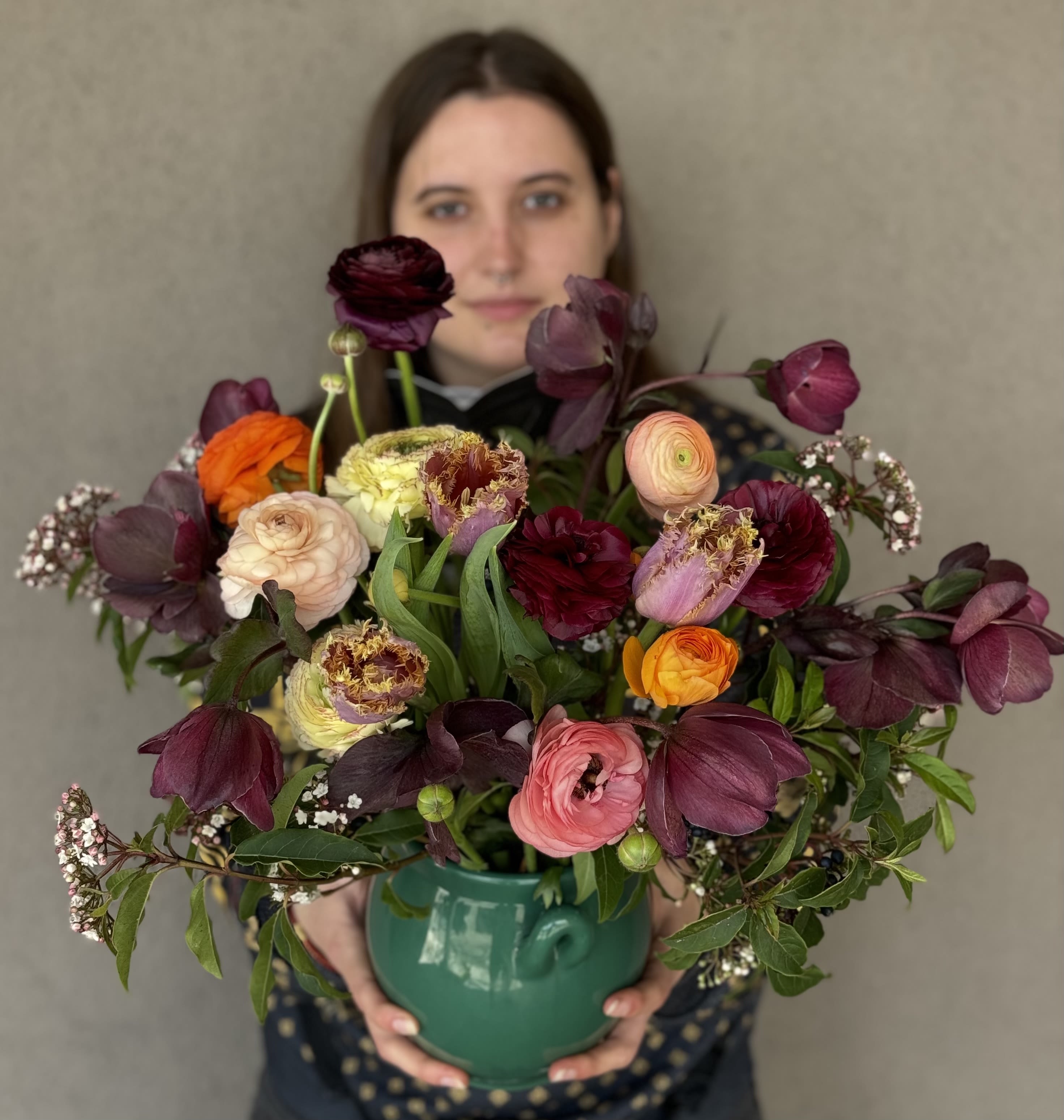 Rich, red thunder Rich, red thunder - This one is my favorite arrangement because it’s muted ,round, and rich in colors, it has hellebore and local ranunculus, butterfly ranunculus (Persian buttercup) and tulips.