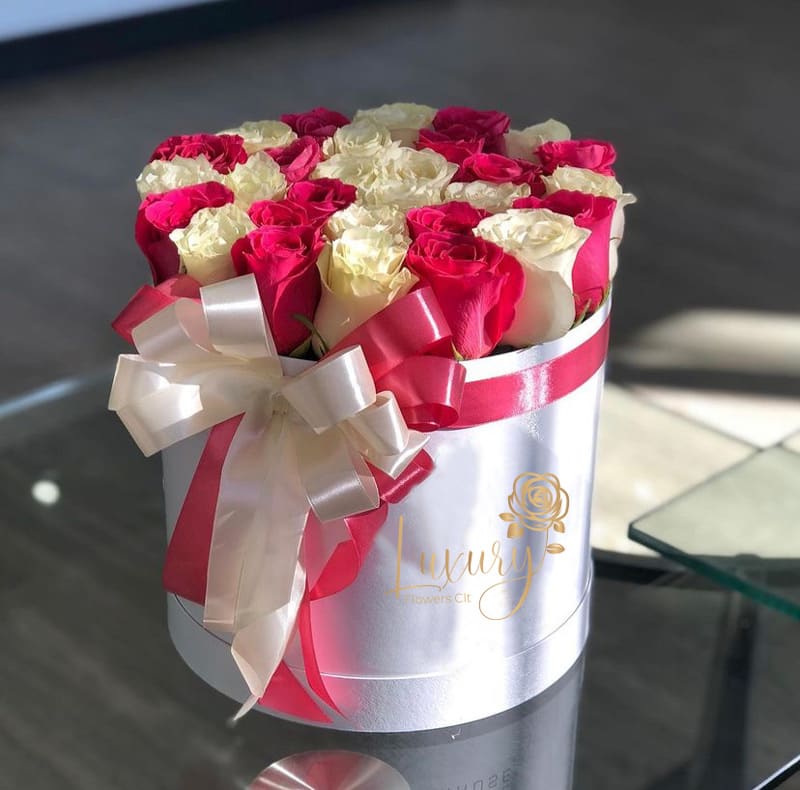 Soulmates Box Soulmates Box - Soulmates, our exclusive design of fresh roses in the beautiful box is a true symbol of luxury arrangements for all occasions. Roses in Box: 30-35 stems of natural roses All Occasion Place your Order Online Monday to Saturday before 1:00 p.m. (E.T.) for same-day delivery. “Orders received after hours will be delivered the next business day”. Check our coverage area. Occasionally, substitutions of flowers and/or containers happen due to weather, seasonality, and market conditions which may affect availability. If this is the case with the gift you’ve selected, we will ensure that your arrangement's style, theme, and color scheme are preserved and will only substitute items of equal value or higher value. CARE INSTRUCTIONS Gently mist the arrangement with natural water every other day. Do not spray any cleaning product on the flower arrangement. Do not place heavy objects directly on the flower arrangement. Keep them out of direct sunlight and extreme heat.
