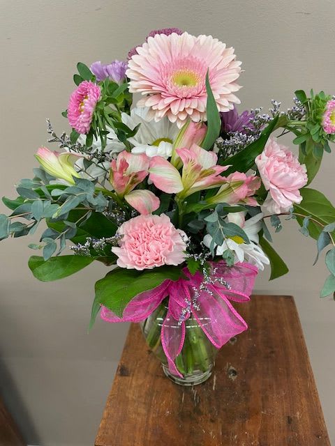 Designer Created Mixed Vase - Prefer a traditional glass vase arrangement? Let our talented designers create a one of kind arrangement filled with a mix of flowers and in a variety of seasonal colors. 