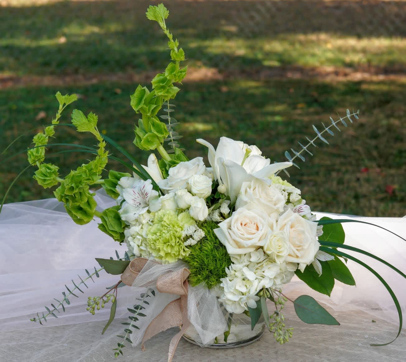 Queen Vicky's Elegance - One of our Beautimous originals, Queen Vicky's Elegance is simply put, ELEGANT!  This arrangement was created with thoughtfulness and compassion always shown by its namesake.  This showstopper is perfect for EVERY occasion!  APPROXIMATE DIMENSIONS - 14&quot; in  X  18&quot; in  SUBSTITUTION POLICY - In dealing with fresh product, sometimes it may become necessary to replace one particular flower for another one.  Rest assured, if we make a substitute, it will be of equal or greater value!  Thanks for your understanding, S &amp; K