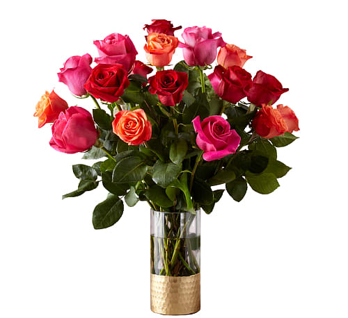 Ever After Rose Bouquet - Live happily with the Ever After Rose Bouquet. Celebrating Valentine's Day's favorite flower, this arrangement features three vibrant hues: orange, hot pink, and red. This trifecta will warm any space they're displayed in and any recipient’s heart.Standard: 18 Roses. Deluxe:24 Roses. Premium:36 Roses. 