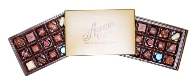Asher's Assorted 1 lb. Boxed Chocolates Asher's Assorted 1 lb. Boxed Chocolates - This 1 lb. Gold Box comes packed full of 2 layers of Asher’s signature confections. It’s all the sweets you love from classic buttercreams and luscious caramels to fruity creams and candied cherries.