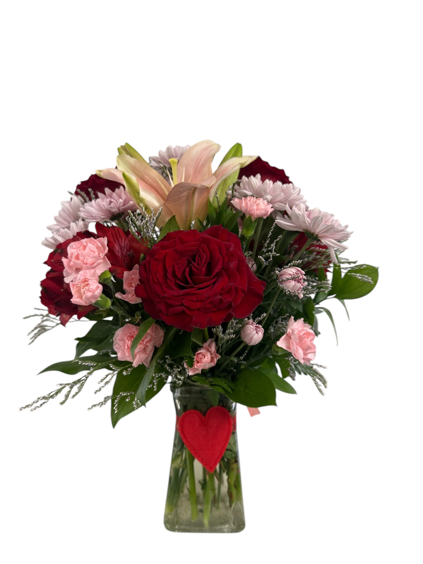 Lotsa Love Lotsa Love - Mixed arrangements last forever...and this one has Valentine's written all over it (god for anniversary too!). The clear glass vase is dressed up with a small plush heart. The flowers are purples, pinks and red - roses, lilies and alstromeria jump out at you. Creating lotsa love among the flowers...