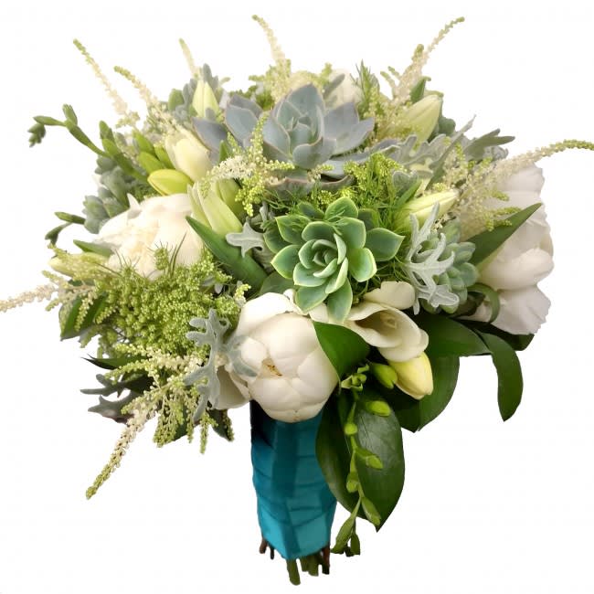 Olivia Bridal Bouquet Olivia Bridal Bouquet - The only thing better than flowers is flowers AND succulents! Our exclusive Olivia Bouquet combines succulents with white peonies, white freesia, astilbe, tulips and dusty miller for a unique look, perfect for Southern California brides. Deluxe package includes both Bridal and Toss Bouquet All of our wedding work is custom, and we can create any bouquet you've always wanted. Contact us online or call us at 619-237-8842 to discuss color options or to schedule a complimentary wedding consultation with one of our wedding designers; you will be glad you did!