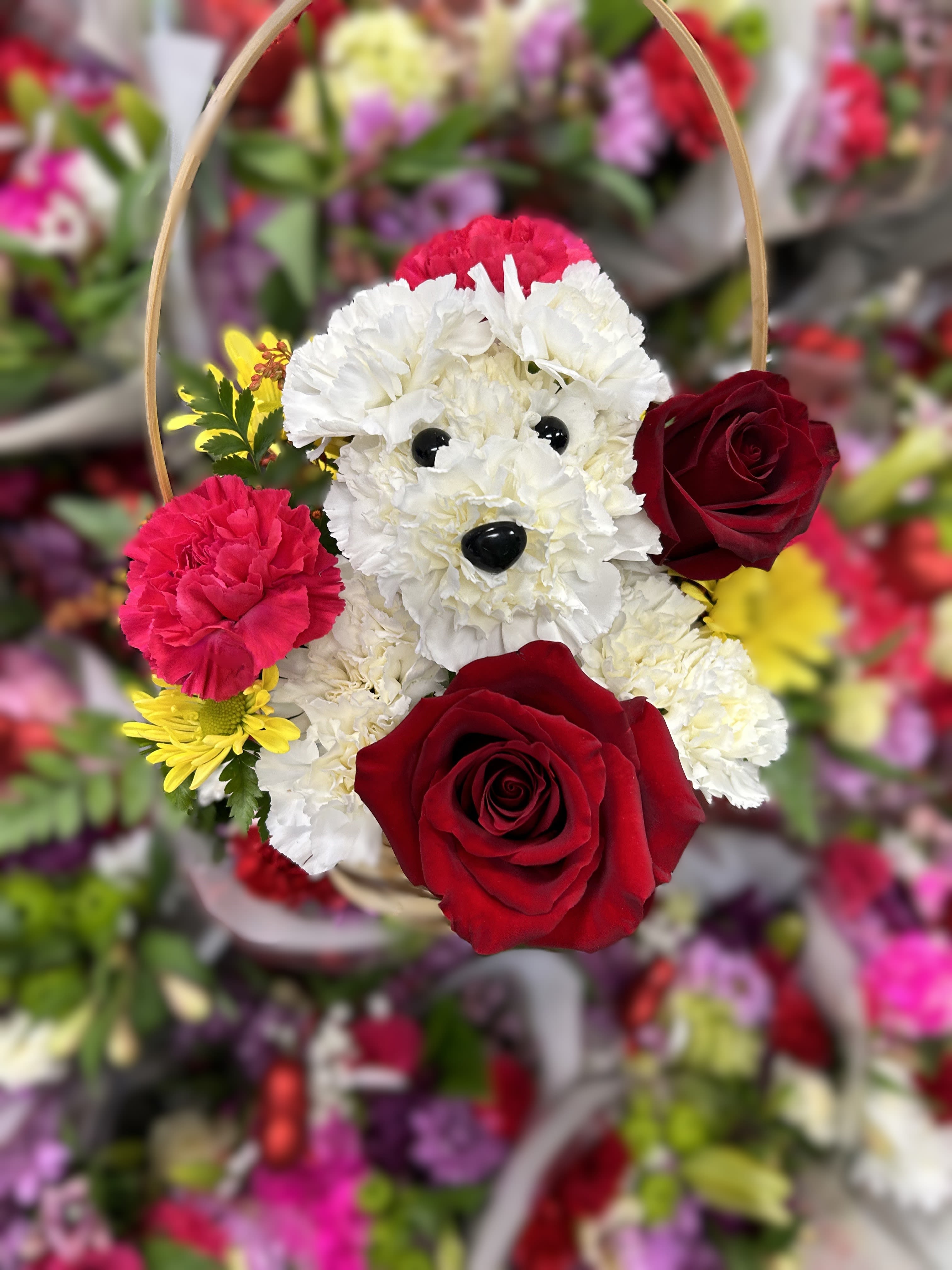 Puppy Love - *PLEASE SPECIFY COLOR OF DOG IN NOTES*  Beautiful flowers in the shape of a lovable pup inside a wooden basket. 