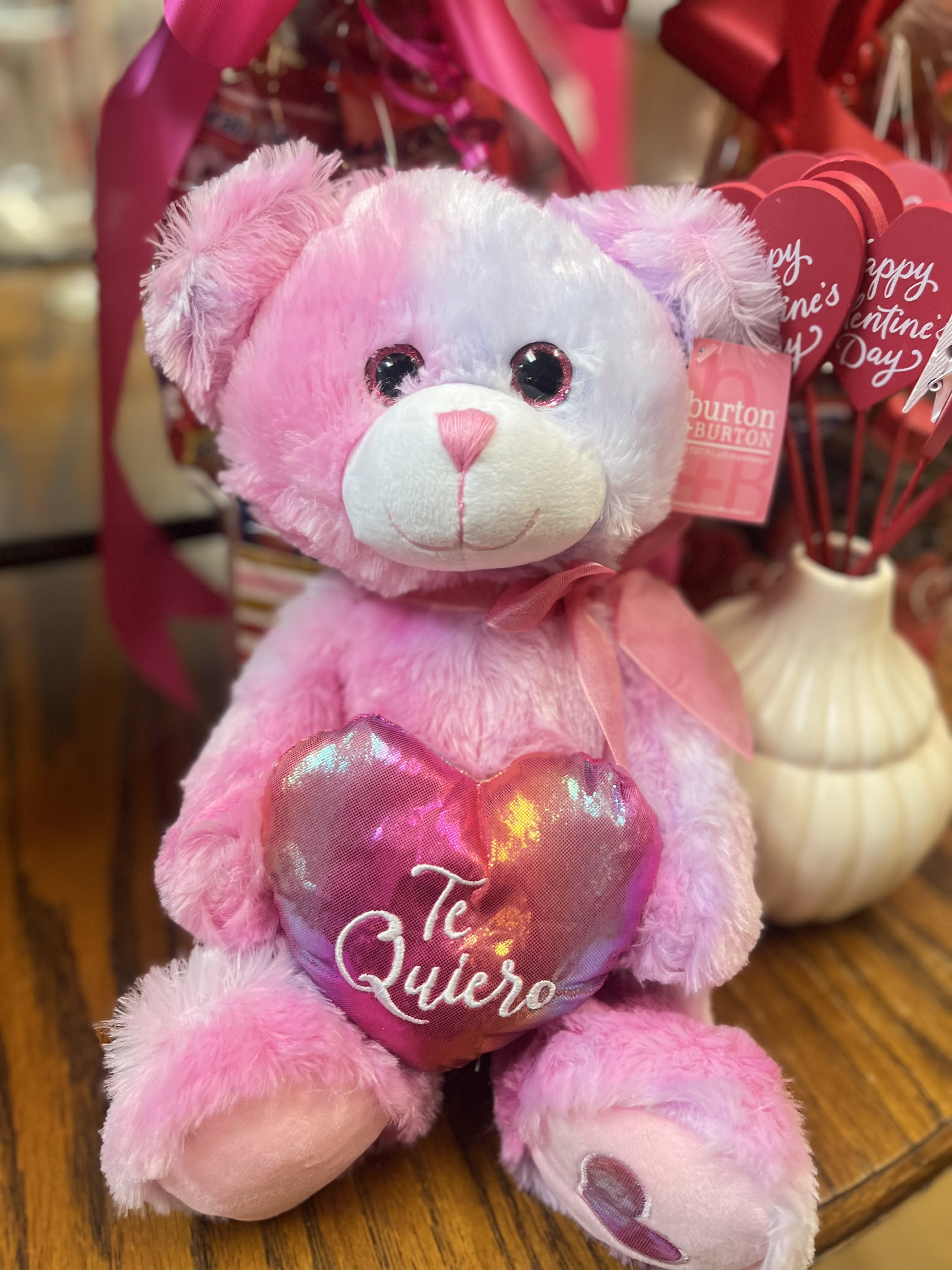 Te Quiero Bear - This beautiful 17” bear, holding “Te Quiero” satin heart,  is a soft, pink tye dye with a purple hue, is cuddly and oh so pink!  
