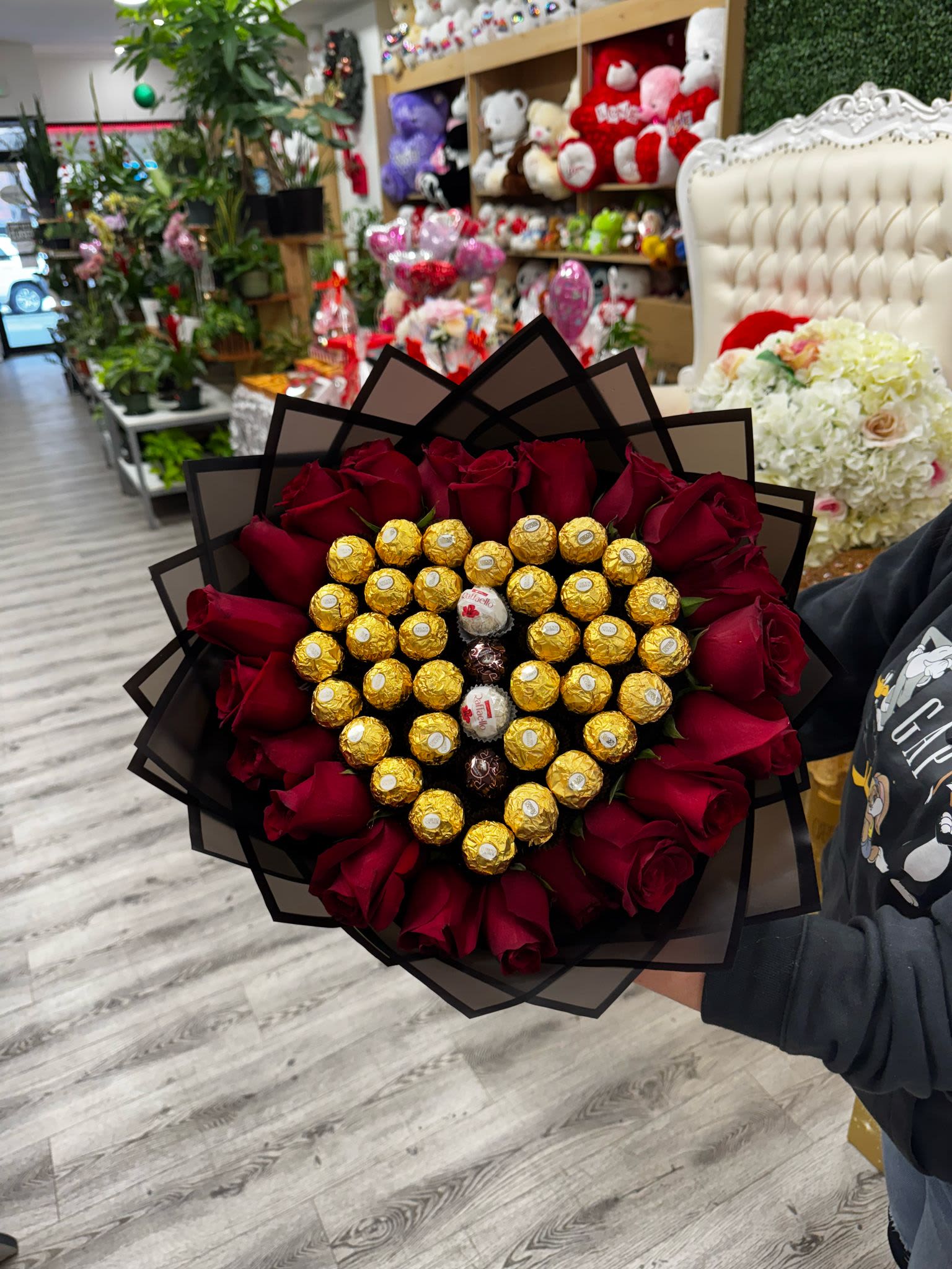 Heart shaped bouquet and chocolates - Bouquet with Ferreros chocolates and red roses, wrapped in floral paper