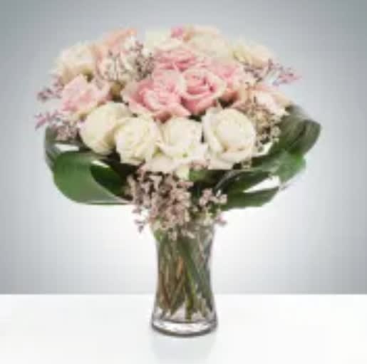 Luxury Love by BloomNation™ - Luxury Love by BloomNation™ is a soft and extravagant rose arrangement that will surely make the recipient gasp. With white and blush roses, this arrangement is pure class and elegance and will surely wow.  Approximate Dimensions: 18&quot;D x 22&quot;H