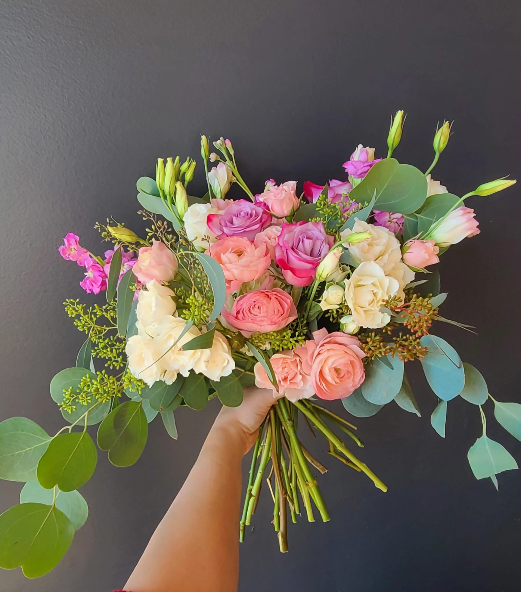 Softer Smiles - Cool off with this lovely bouquet of roses and hydrangeas. Handtied bouquet without a vase.