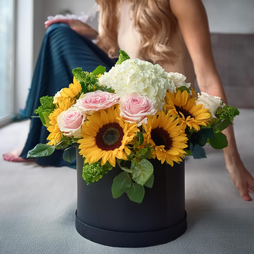 A little &quot;Pick me up&quot; - A Round box arrangement of hydrangeas, roses, and sunflowers. How can something so cute be so meaningful? Show them you care with this little pick me up!