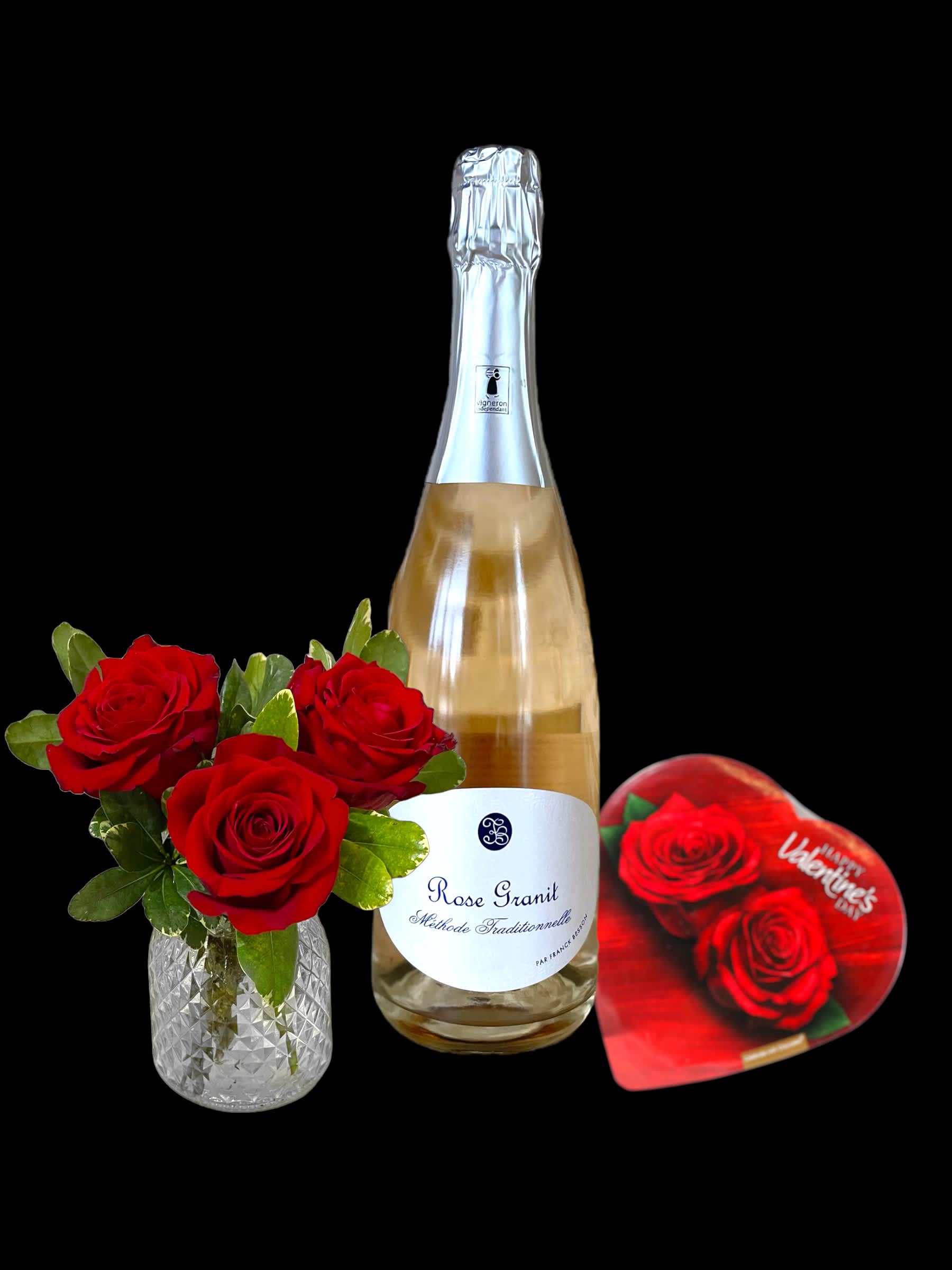 SPECIAL Valentine Be Mine Trio - A perfect trifecta designed to compliment each other and express Love! A trio of roses arranged in a pretty vase, a rosé sparkling wine and a small box of assorted chocolates. It’s the works!  Rose colors may vary depending on availability.