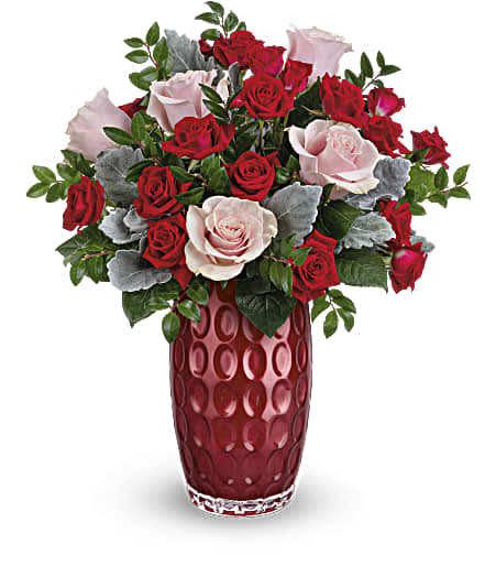 Teleflora's Love Always Bouquet - Forever has never looked more fabulous than this charming pink and red rose bouquet, arranged in a pearlescent glass vase with modern debossed pattern.