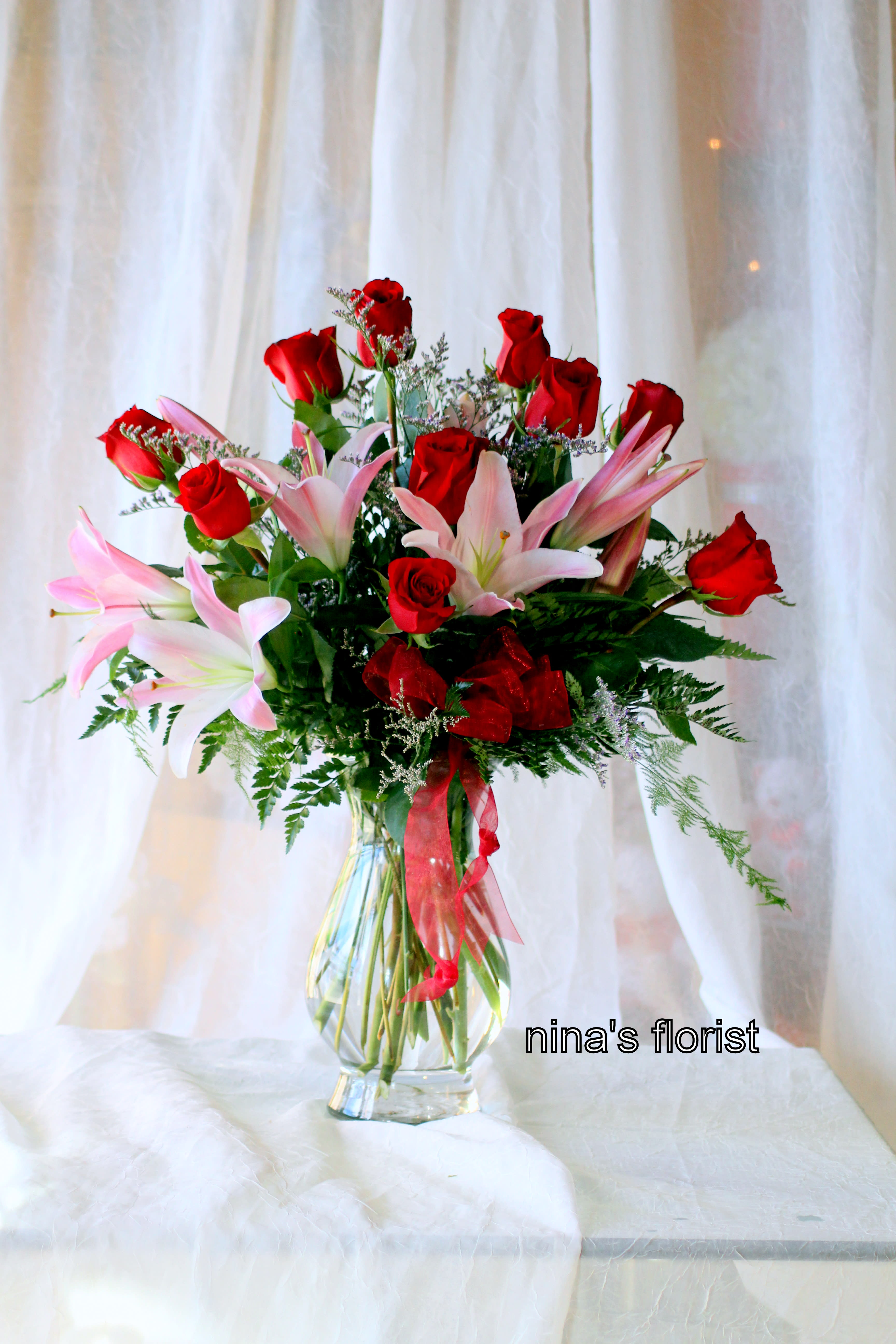 What a Delight - Wonderfully fragrant bouquet of select roses and oriental lilies.