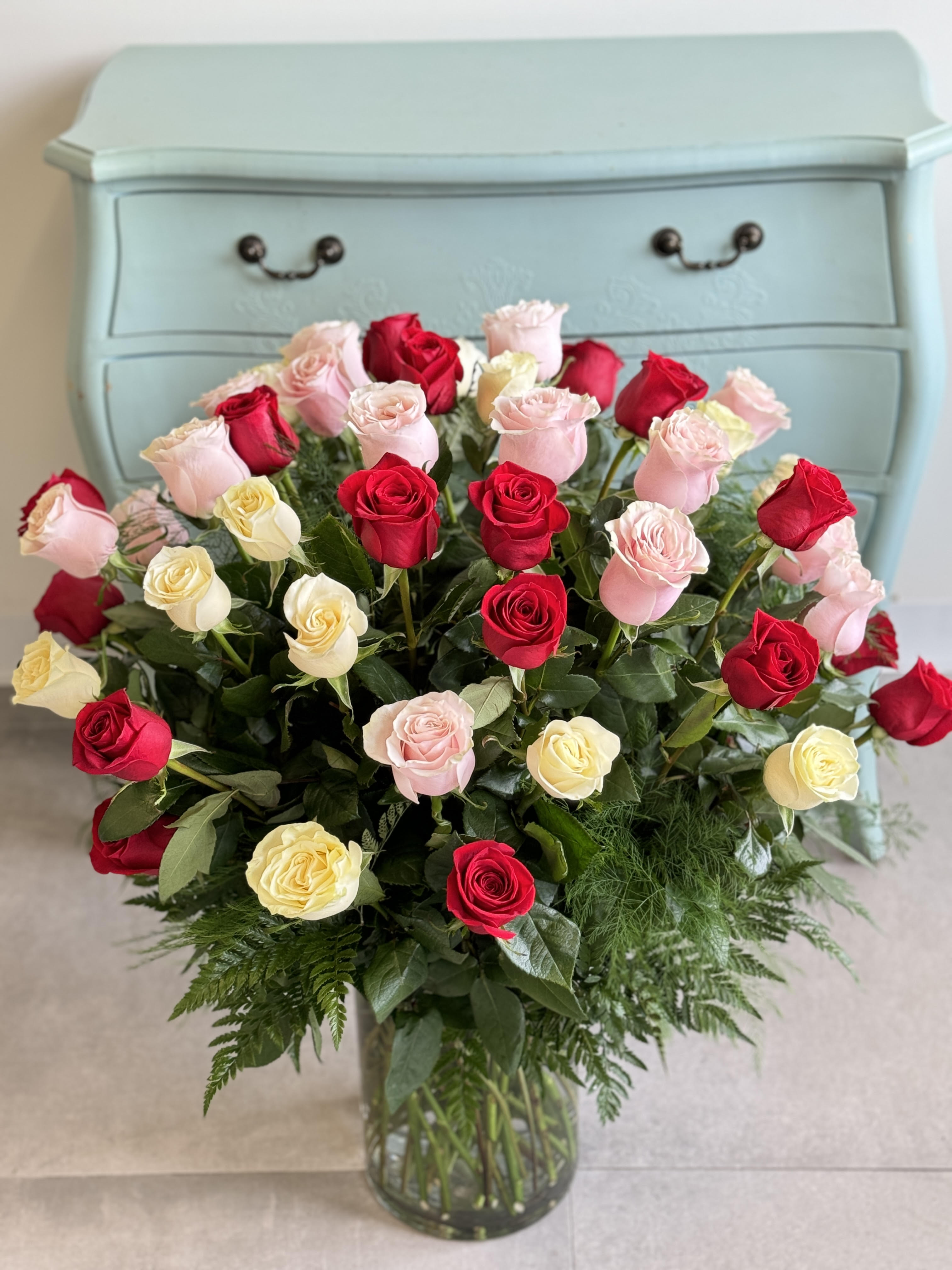 50 Long Stem Roses 50 Long Stem Roses - Absolutely gorgeous bouquet of 50 long stem, 70cm roses with a mix of the classic colors: red, pink and white. Please note if you would like to customize the colors