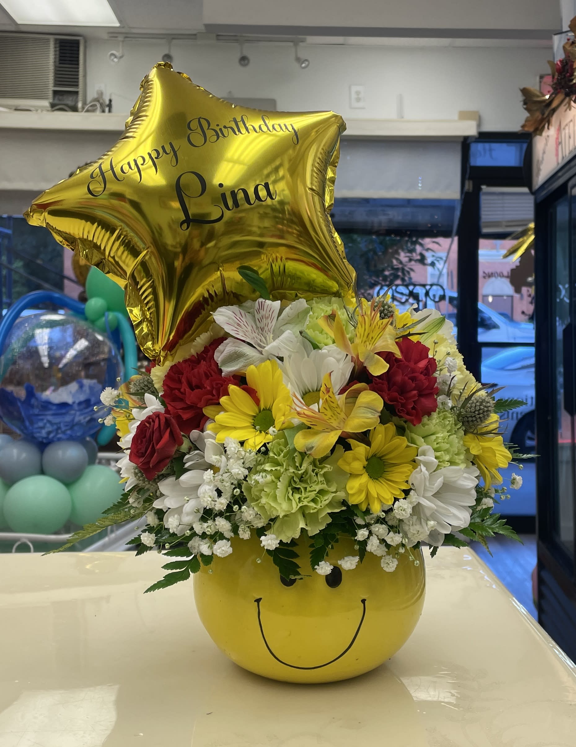 Cara sonriente - Mix of Flowers .Custom Balloon.Contact the store to personalize