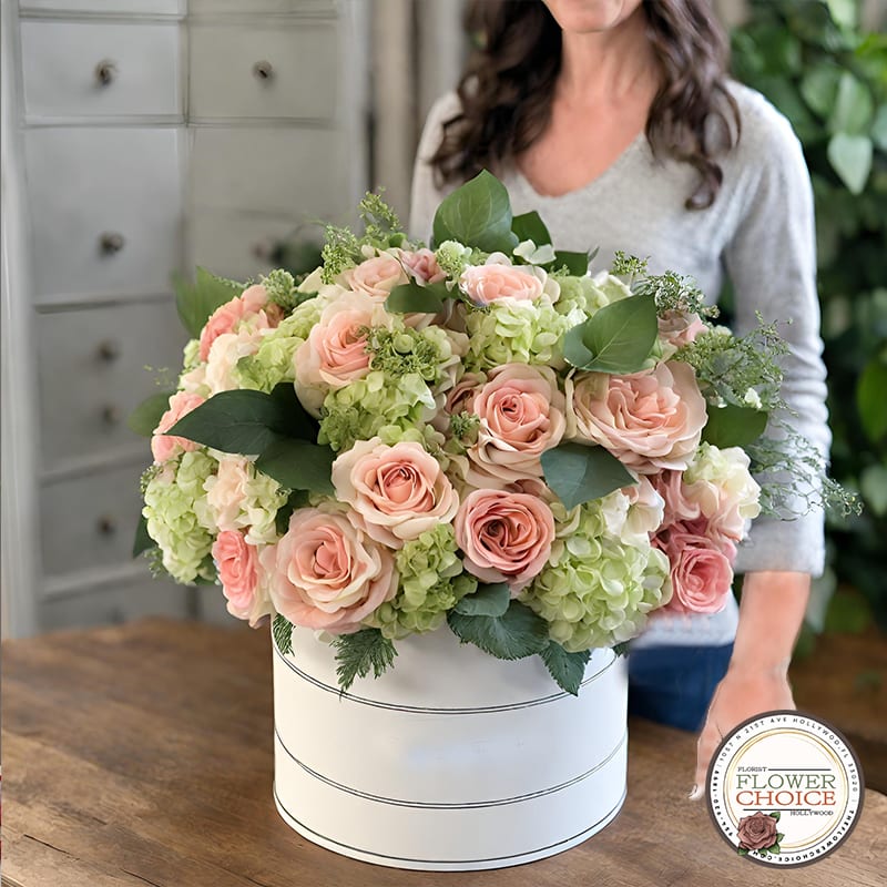 Cherished Harmony - Find harmony in the delicate balance of roses and hydrangeas adorning this arrangement in a graceful white hat box. Cherished Harmony is a symbol of unity and lasting connection.