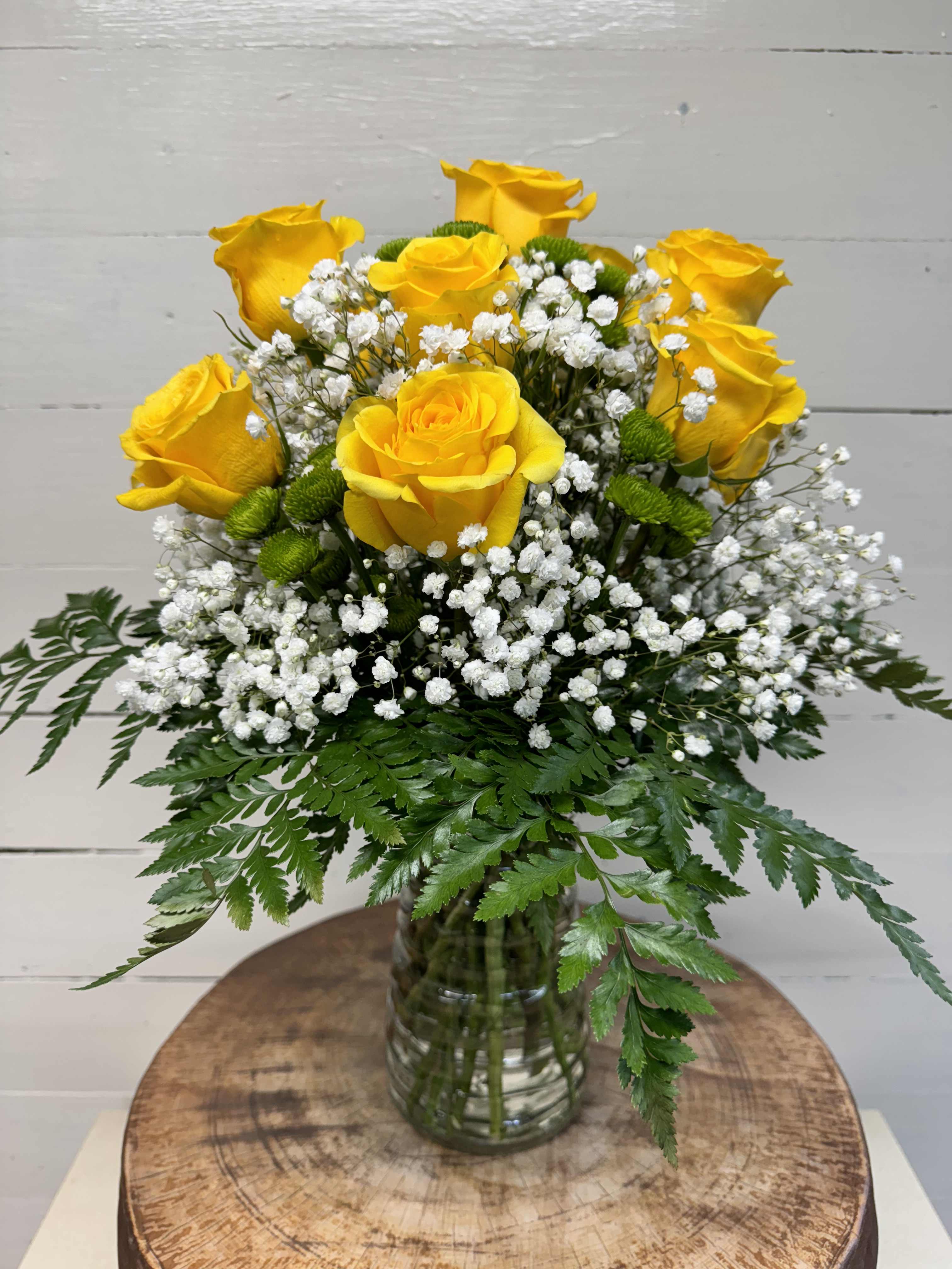 Sunny Love - Yellow roses are a great option to send a non-romantic love. Send a dozen yellow roses to your friend or family member to brighten up their space and celebrate them! Yellow roses are a good gift for graduations, birthdays, or celebrating an accomplishment like a new job.  Approximate Dimensions: 18&quot;D x 25&quot;H