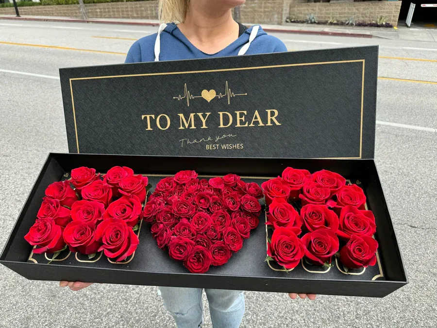 MOMents of Love - Pamper Mom with Exquisite Mother's Day flower arrangement, featuring stunning red roses perfectly arranged to spell out &quot;MOM.&quot; This elegant gift is thoughtfully curated to express your deepest love and appreciation, making it the perfect way to celebrate her on this special day.