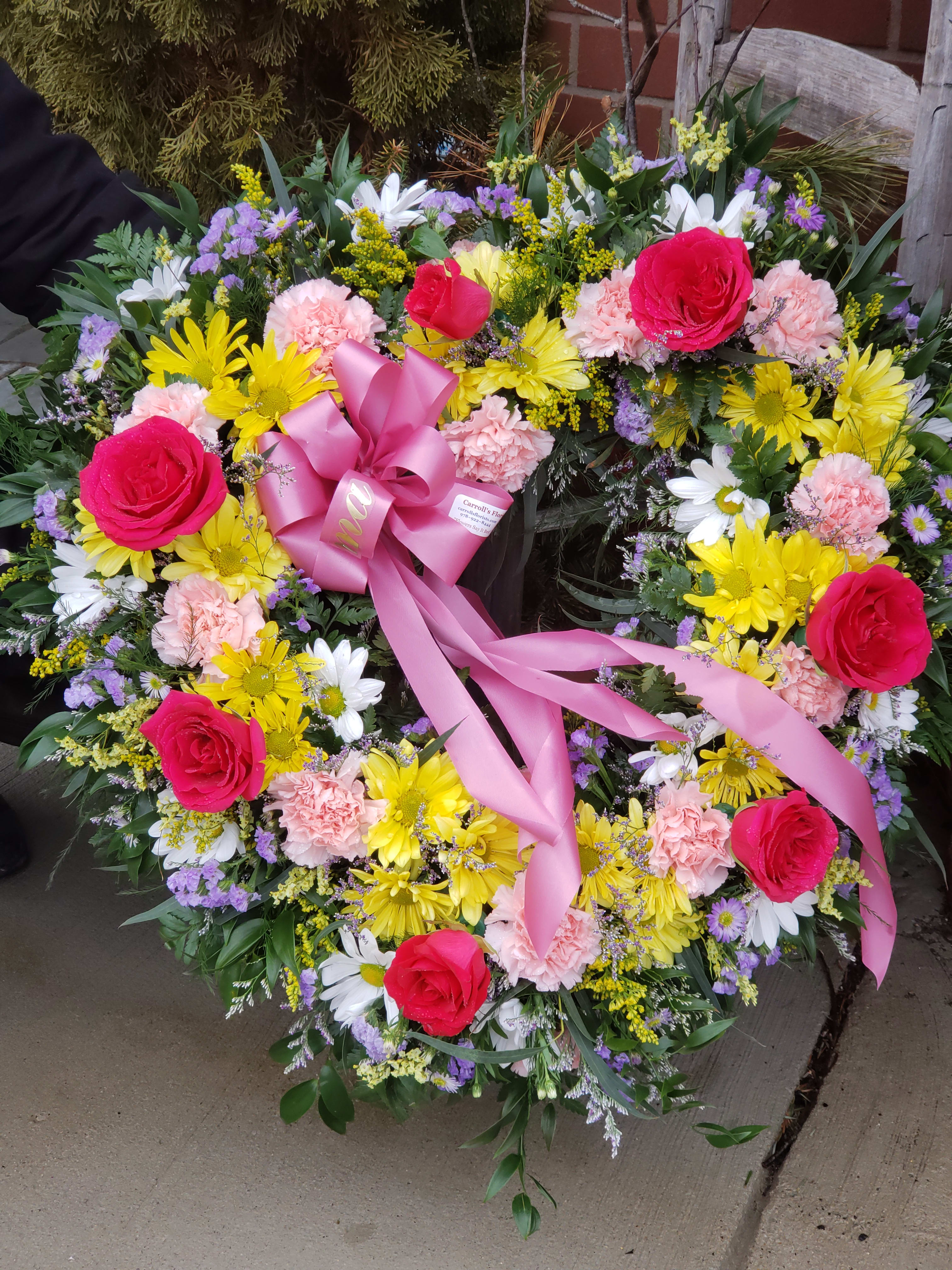 Graceful Open Heart Graceful Open Heart - Mixed variety of flowers, roses & fillers all designed with greens in the open heart style. Colors can vary at time of order & delivery date. Sample photo for style & shape.