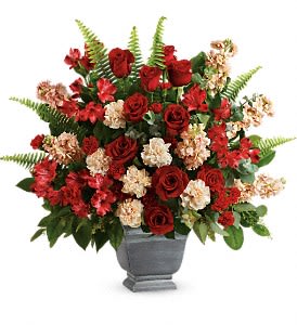 Bold Tribute Bouuet Bold Tribute Bouuet - A bold expression of your deepest condolences, this elegant mix of red and peach blooms in a large antiqued pot brings strength and comfort.