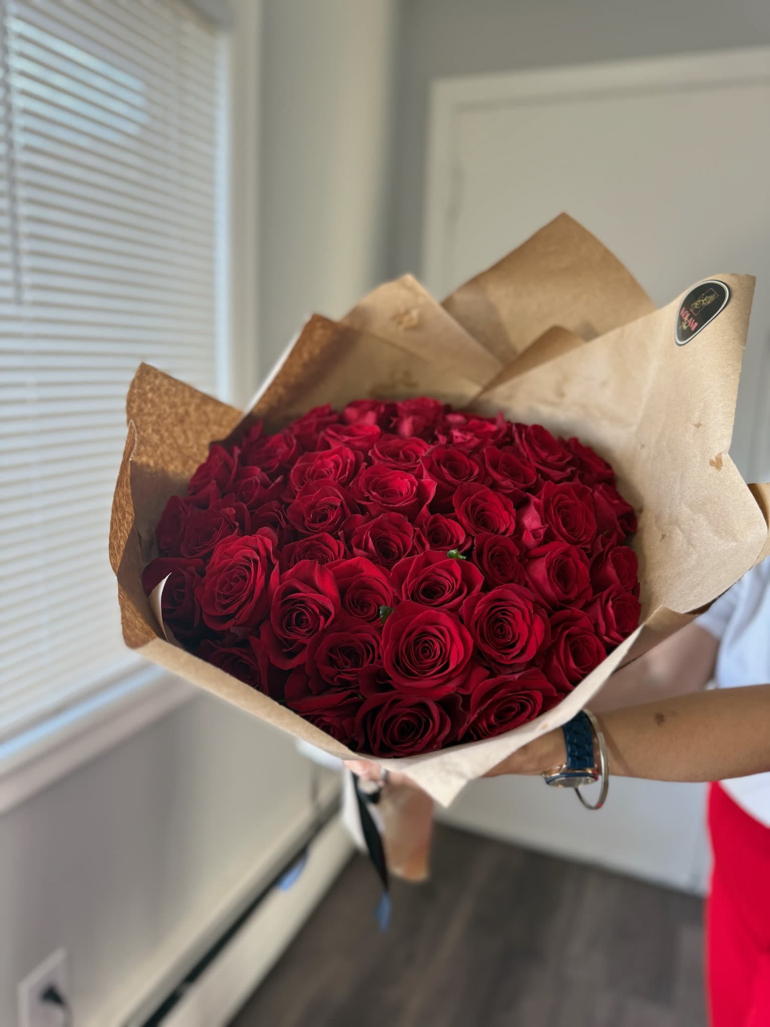 Red Roses Bouquet - Red Roses Bouquet Wrapped in Brown Floral Paper.