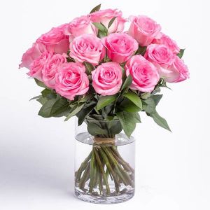 Roses "18" in PINK Roses "18" in PINK - For that someone special , 18 Pink Roses arranged in a cylinder, gathered for that special modern look.