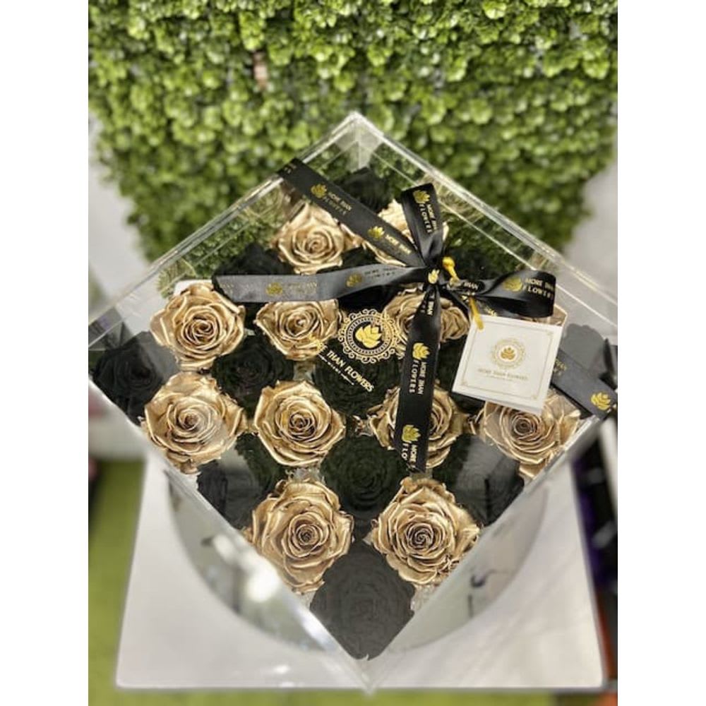 Eternal Roses Acrylic Box (25 Roses) - Gold/Black - Eternal Roses Acrylic Box (25 Roses): We stopped the clock for our preserved roses to experience our Eternal Deluxe Collection timelessly. 25 preserved roses decorated in our signature deluxe clear acrylic boxes and completed with a bow and a personalized card message, trendy and fancy. Roses that Last 3 years. Avoid direct sunlight, dust, water or excessive heat. *Available for Nationwide Shipping (5-7 days shipping time)