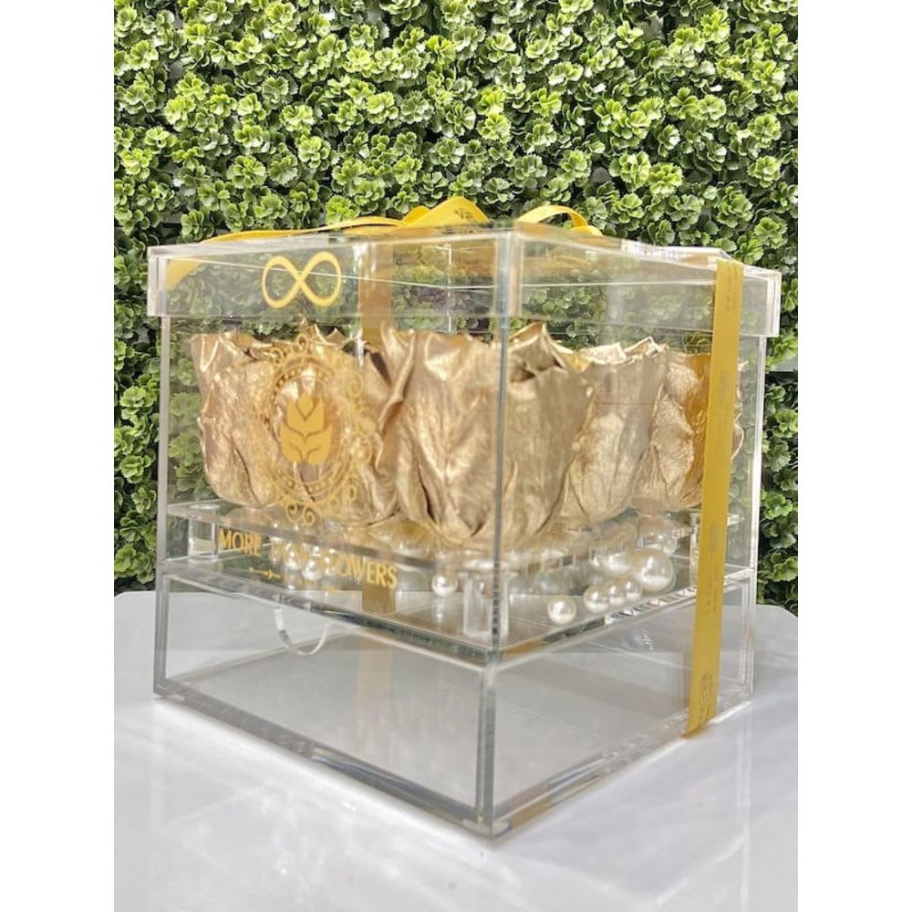 Eternal Roses Acrylic Box (9 Roses) - Gold - Eternal Roses Acrylic Box (9 Roses): We stopped the clock for our preserved roses to experience our Eternal Deluxe Collection timelessly. 9 preserved roses decorated in our signature deluxe clear acrylic boxes and completed with a bow and a personalized card message, trendy and fancy. Roses that Last 3 years. *Avoid direct sunlight, dust, water or excessive heat. *Available for Nationwide Shipping (5-7 days shipping time)